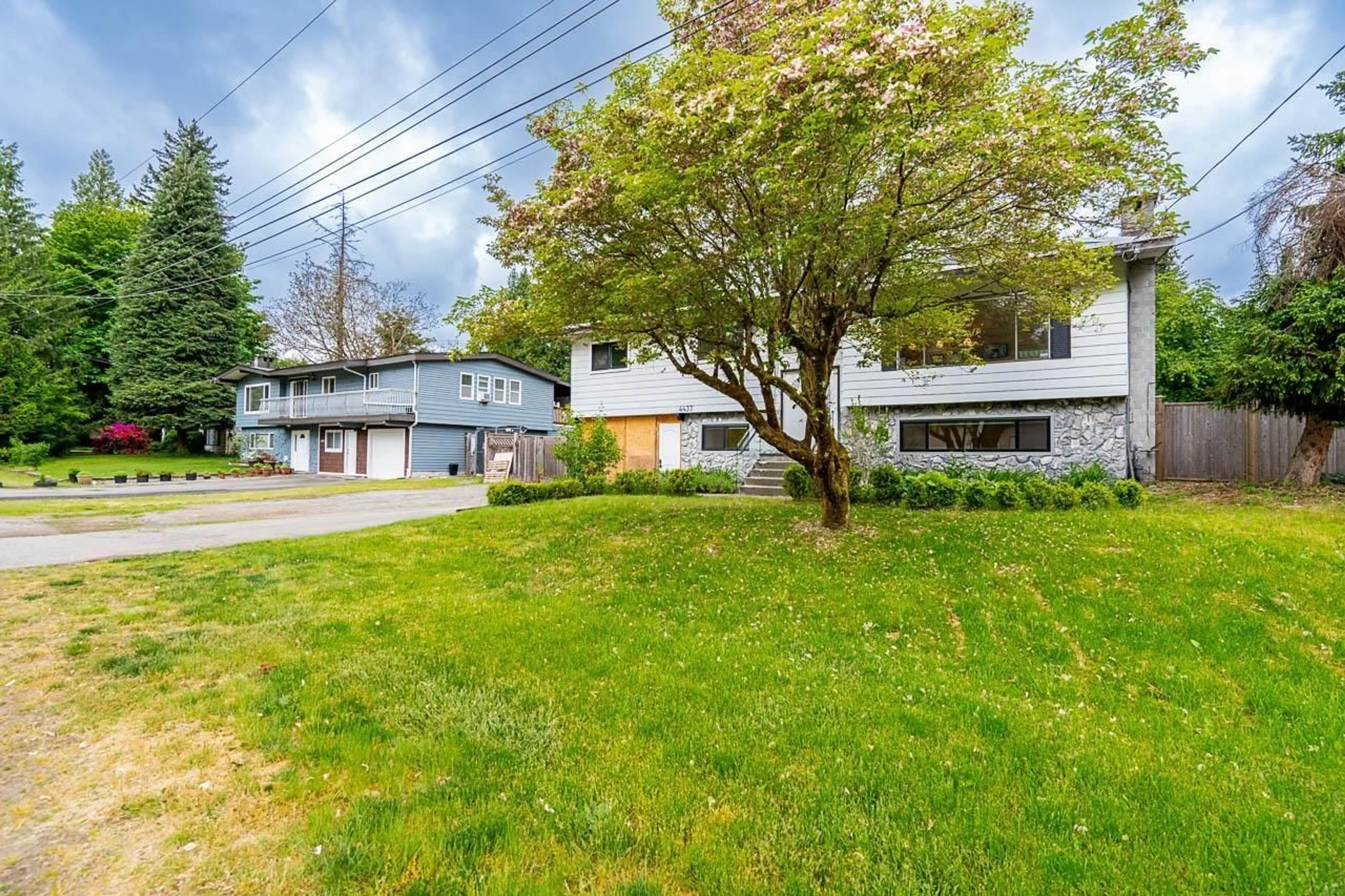 A pic from outside/outdoor area/front of a property/back of a property/a pic from drone, street for 4437 196A, Langley British Columbia V3A4W1