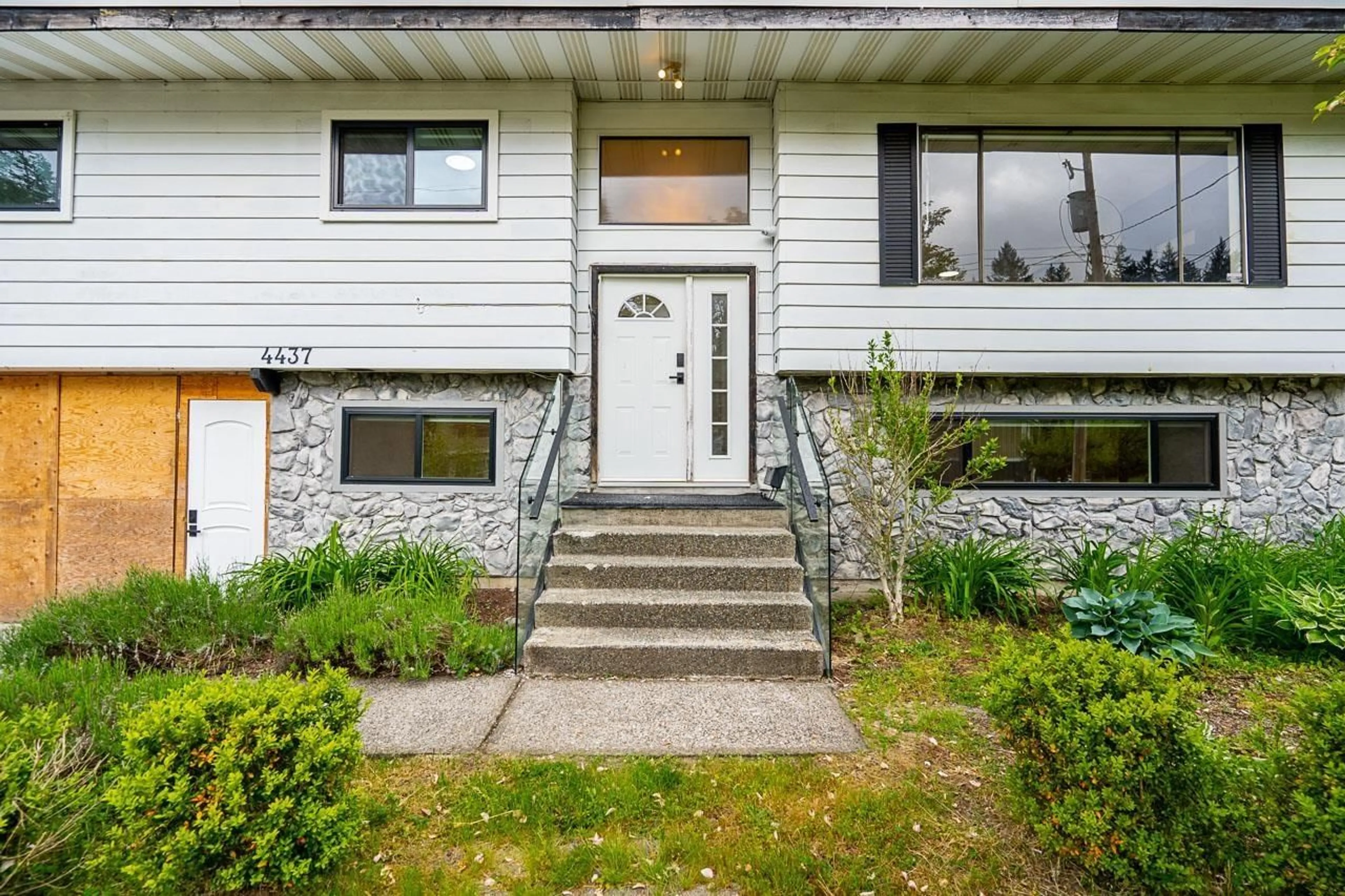 Home with vinyl exterior material, street for 4437 196A, Langley British Columbia V3A4W1