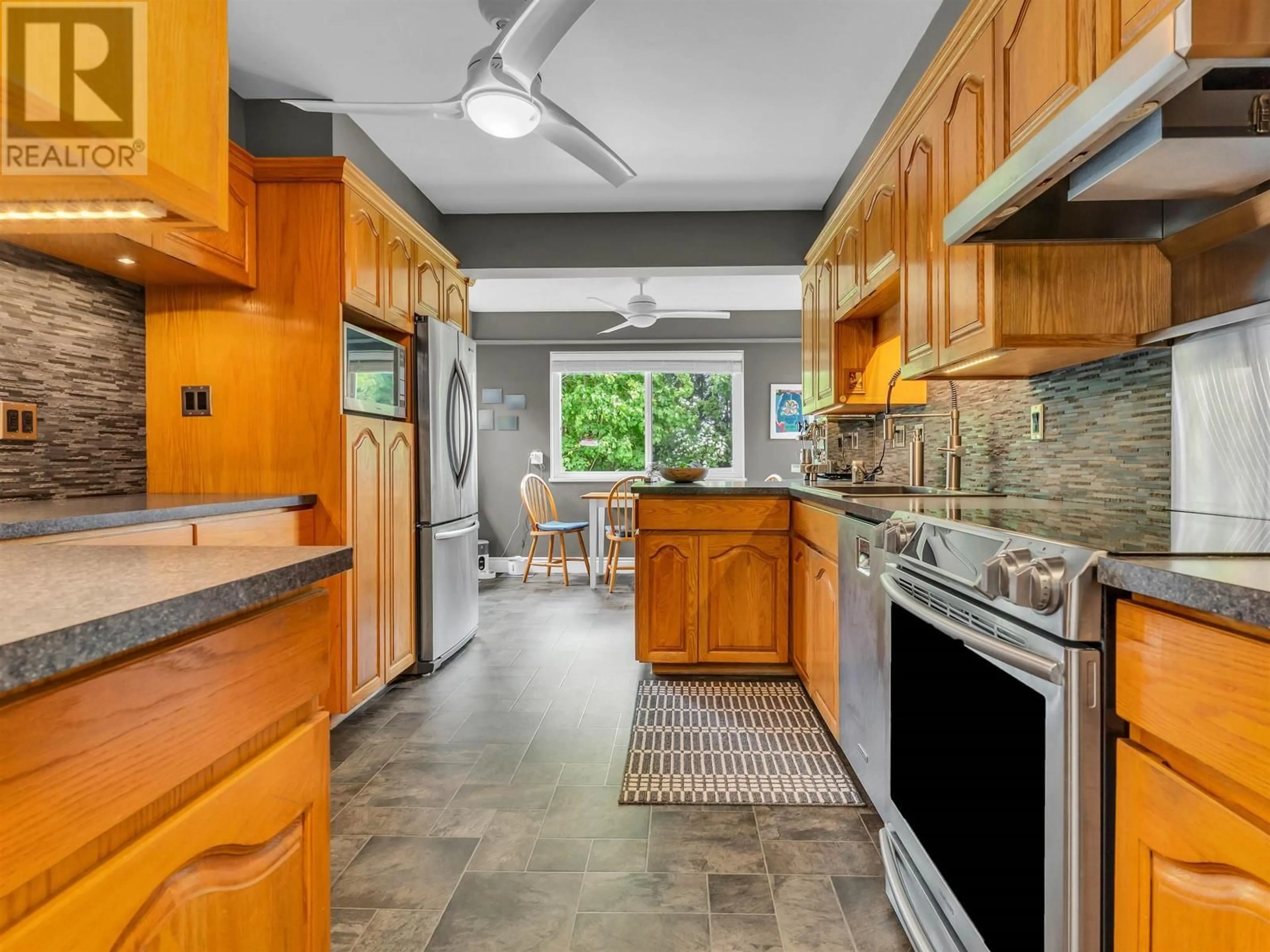 Open concept kitchen, ceramic/tile floor for 10360 ANAHIM DRIVE, Richmond British Columbia V7A3C5