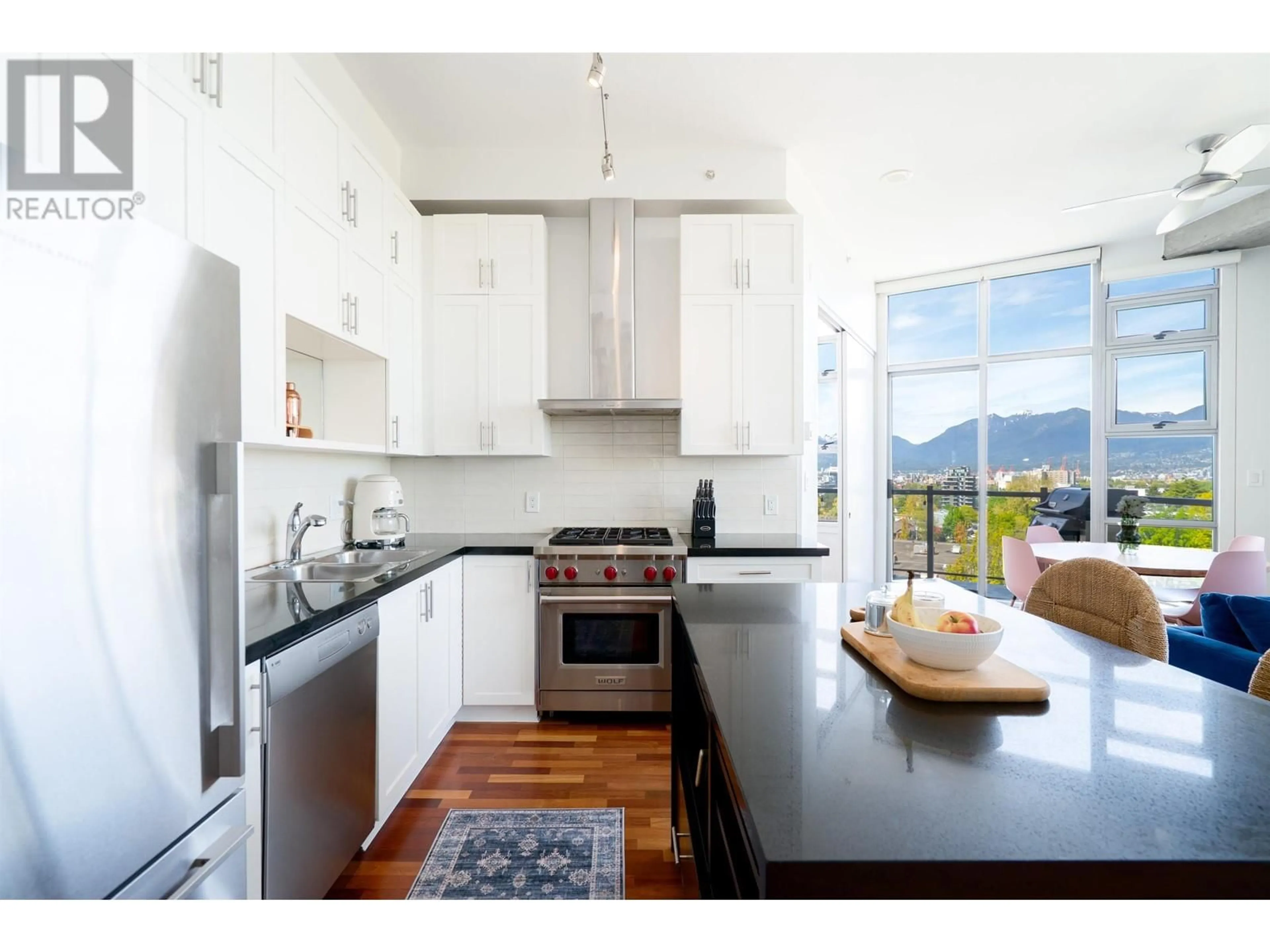 Open concept kitchen, unknown for 607 - 2635 PRINCE EDWARD STREET, Vancouver British Columbia V5T4V7