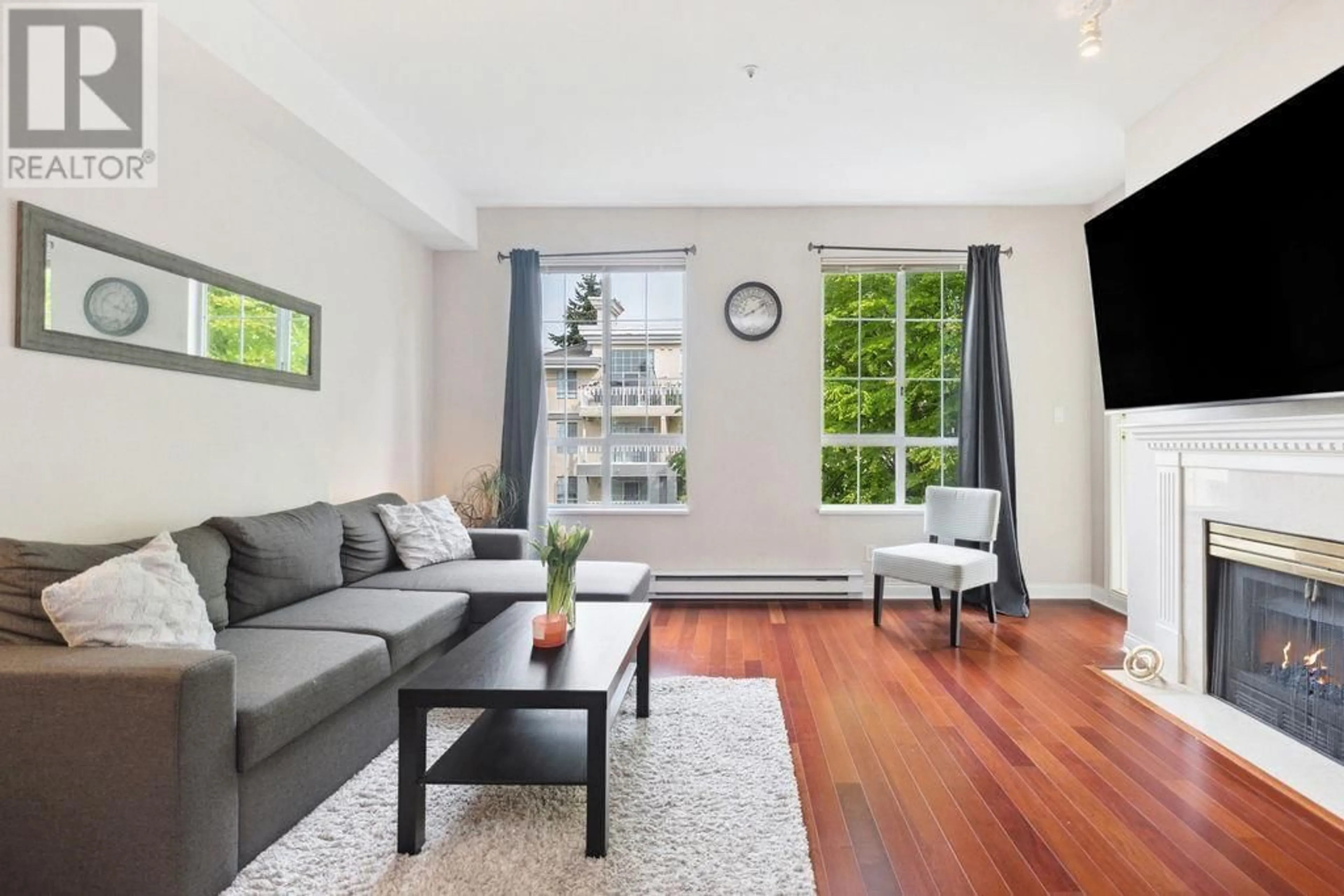 Living room with furniture, wood/laminate floor for 300 - 5835 HAMPTON PLACE, Vancouver British Columbia V6T2G2