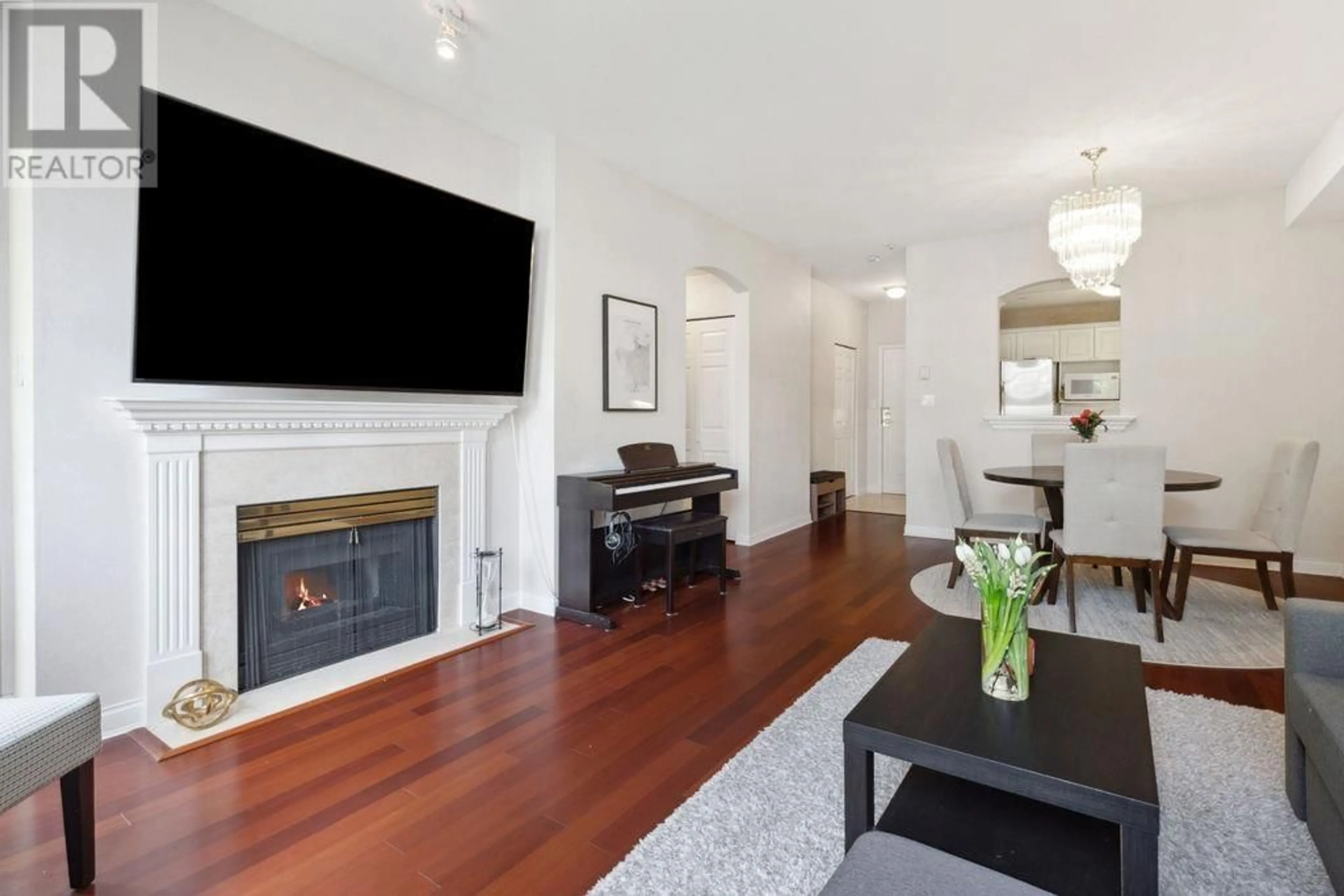 Living room with furniture, wood/laminate floor for 300 - 5835 HAMPTON PLACE, Vancouver British Columbia V6T2G2