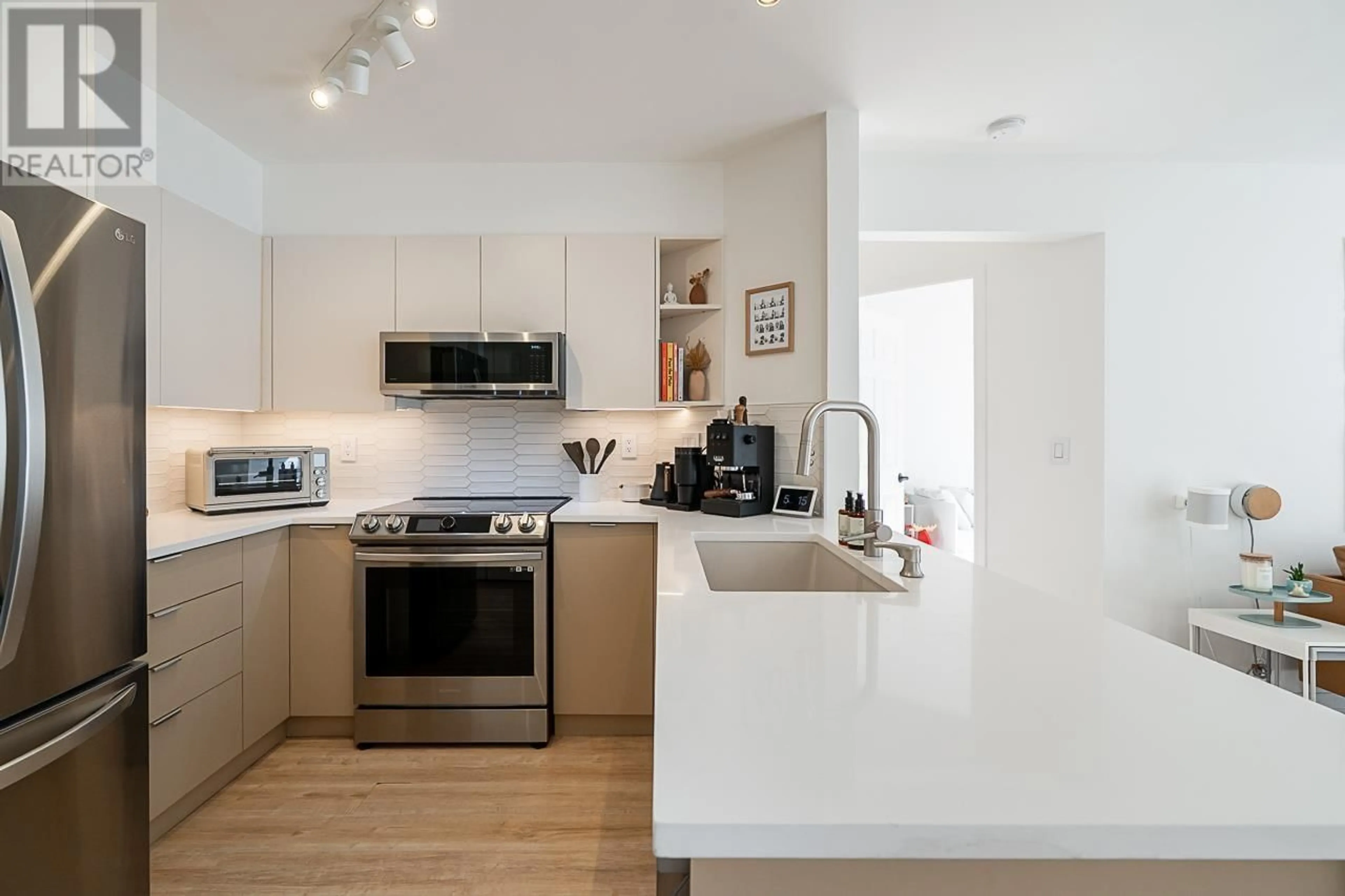 Open concept kitchen, unknown for 106 - 3625 WINDCREST DRIVE, North Vancouver British Columbia V7G2S6