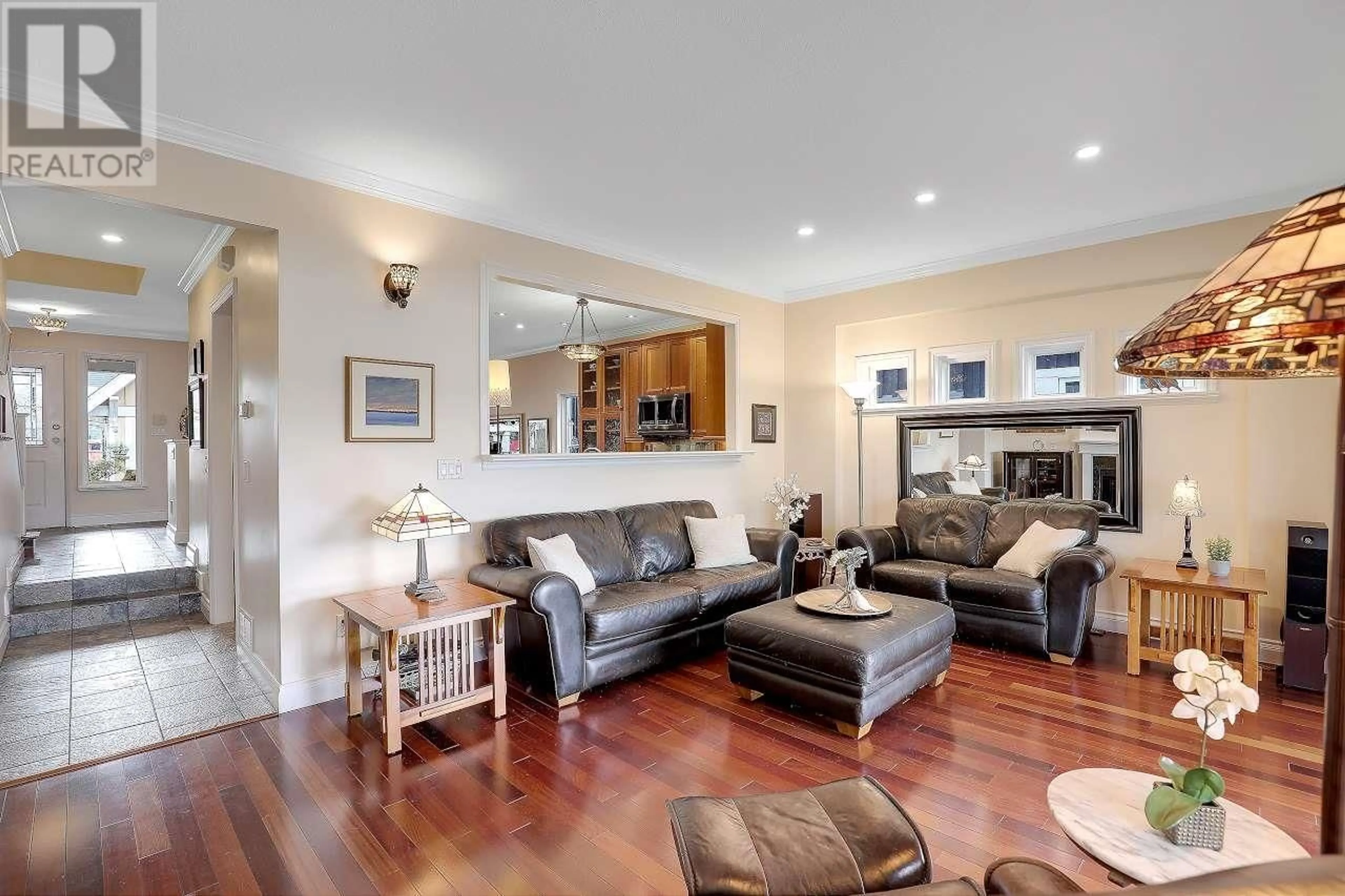 Living room with furniture, wood/laminate floor for 165 FAIRWEATHER LANE, New Westminster British Columbia V3M6X6