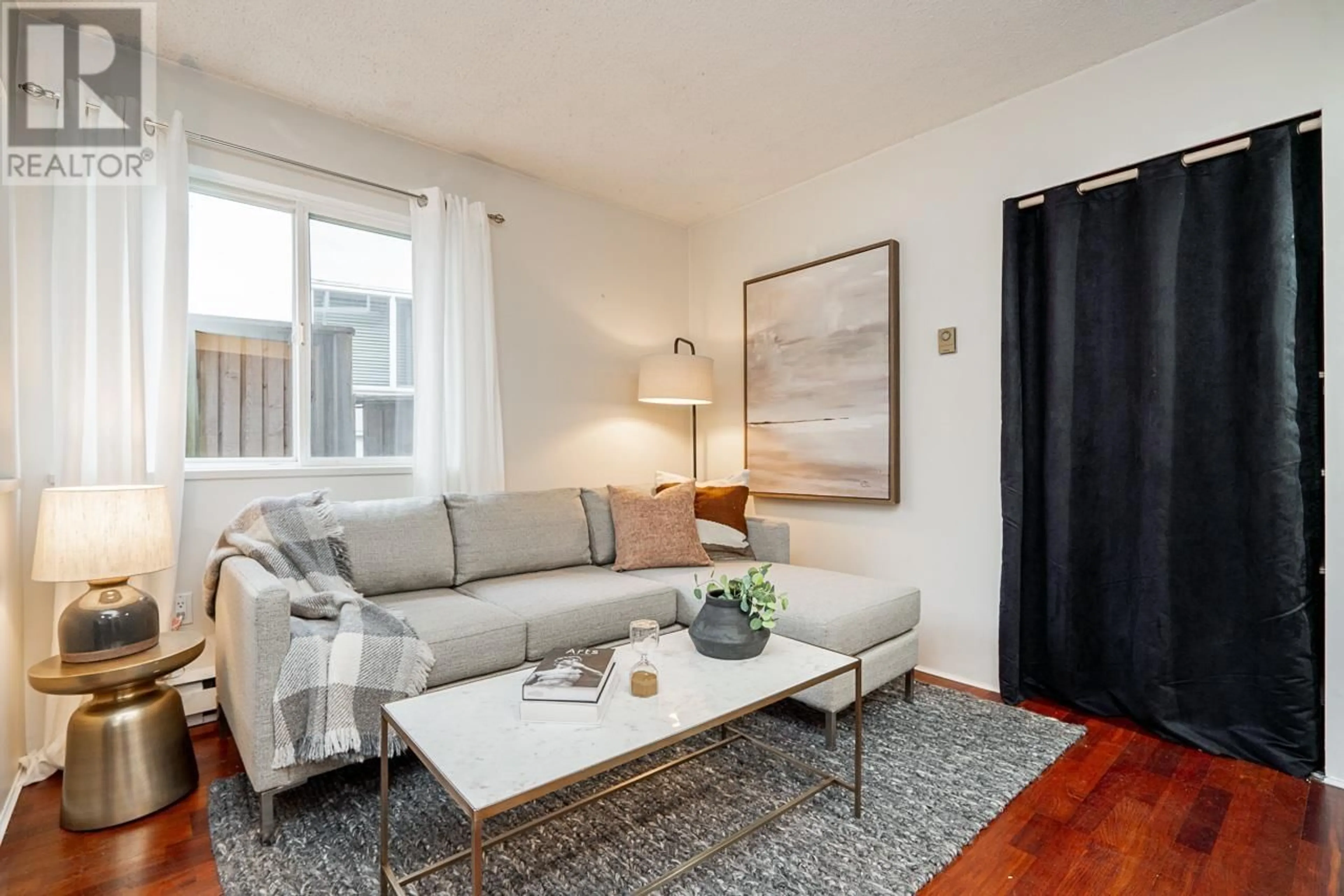 Living room with furniture, unknown for 204 - 2239 1ST AVENUE, Vancouver British Columbia V6K1E9