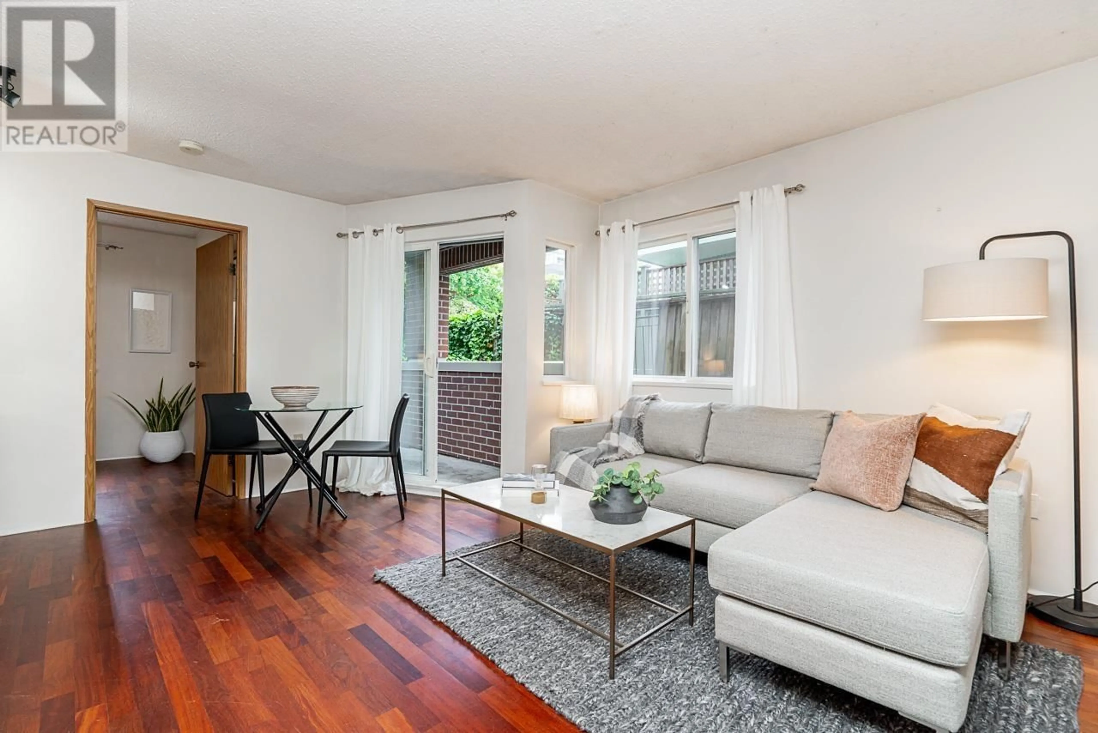 Living room with furniture, wood/laminate floor for 204 - 2239 1ST AVENUE, Vancouver British Columbia V6K1E9