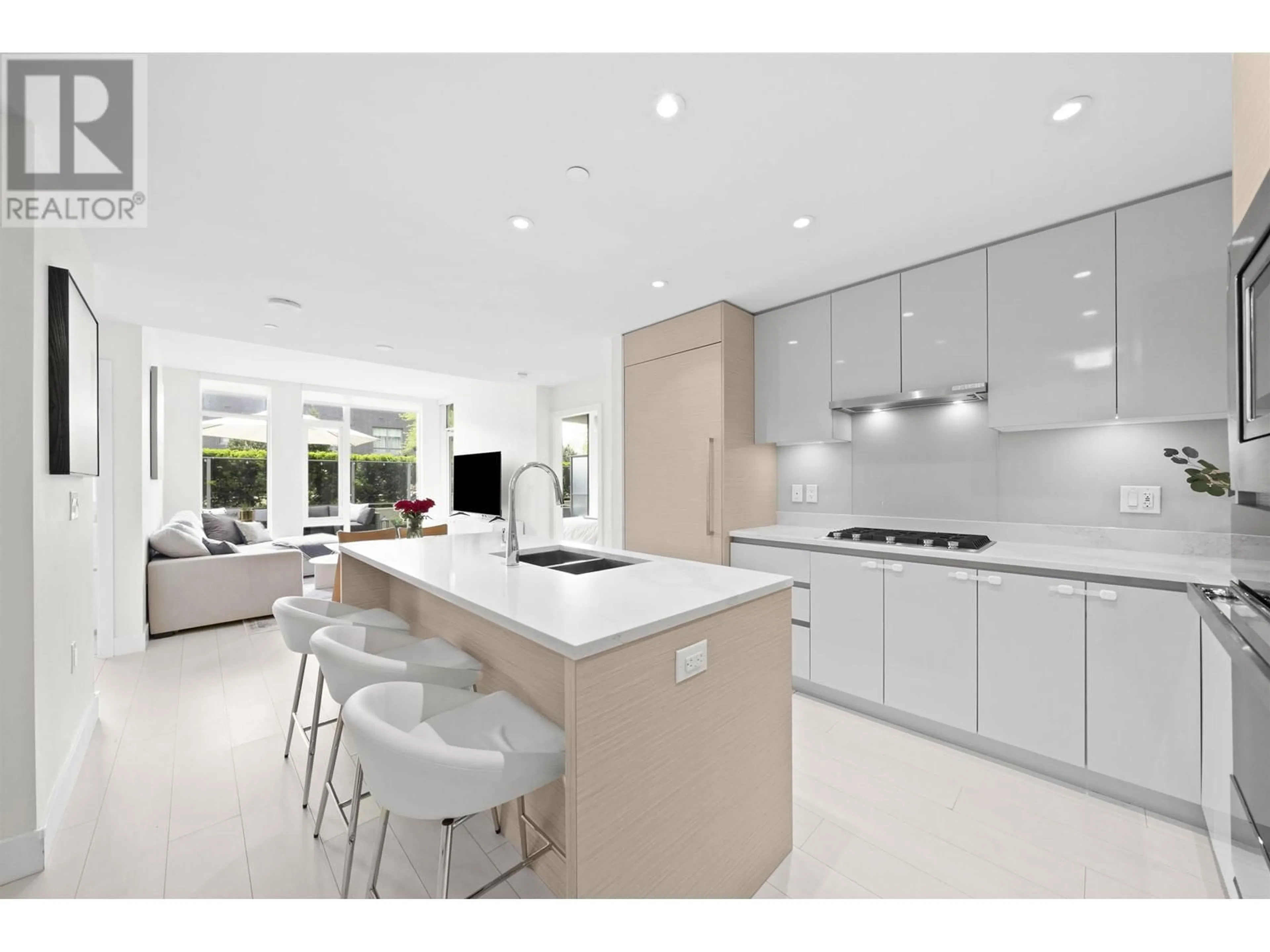Open concept kitchen, ceramic/tile floor for 208 - 3538 SAWMILL CRESCENT, Vancouver British Columbia V5S0J8