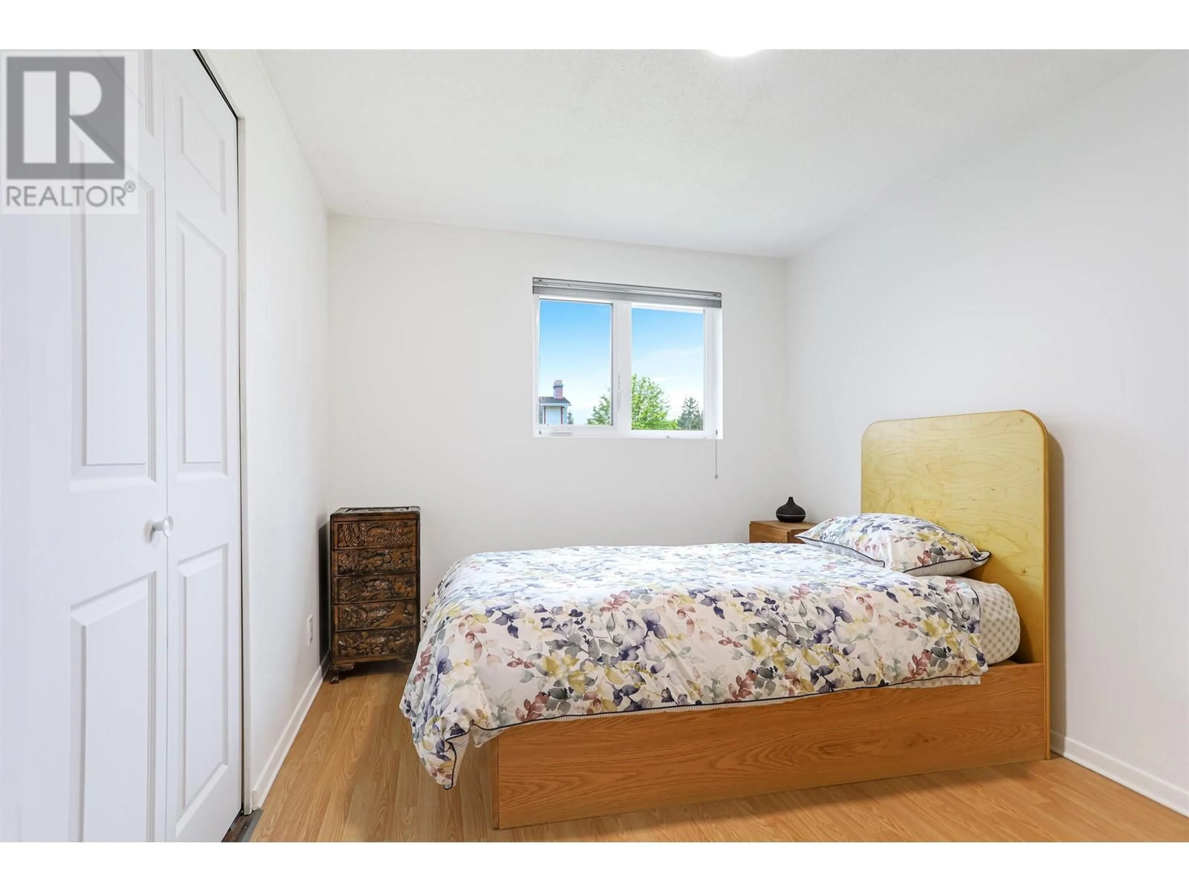 Bedroom with bed, wood/laminate floor for 59 CARLSON STREET, Kitimat British Columbia V8C1A9
