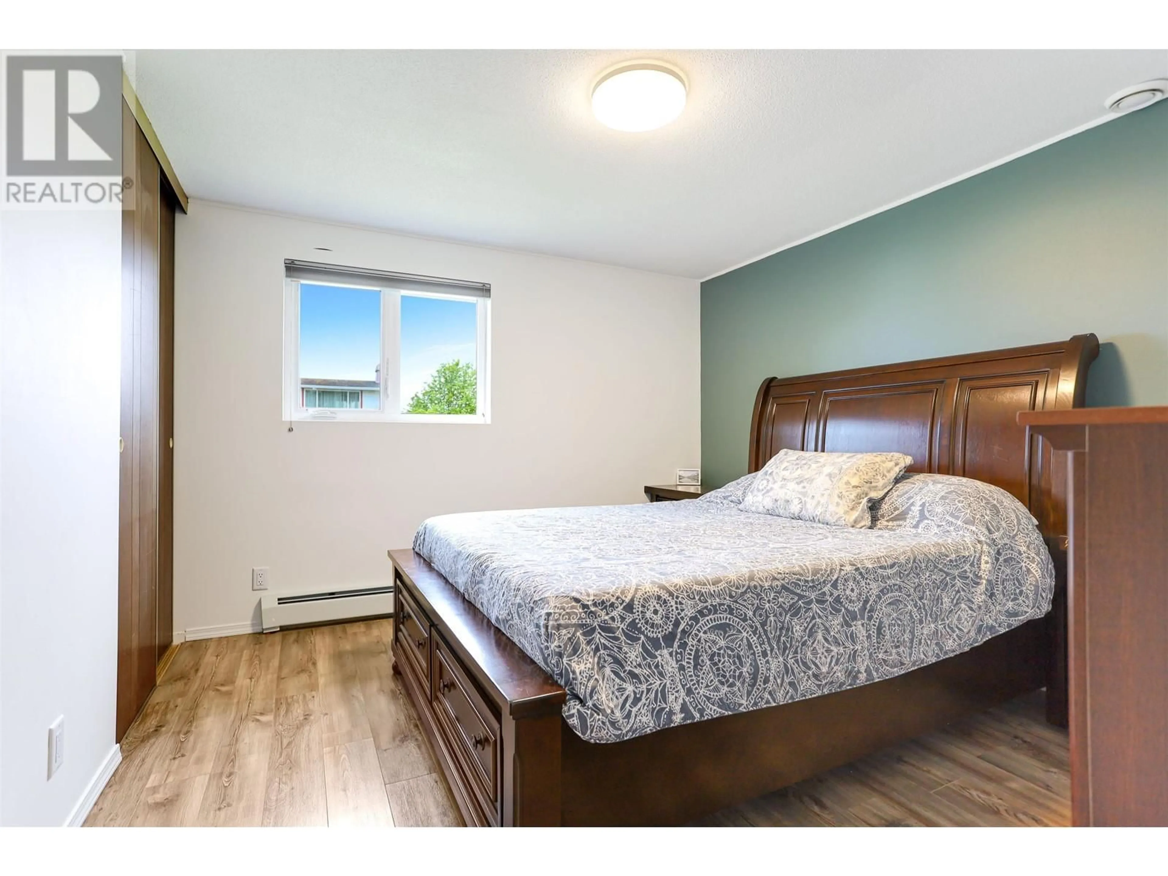 Bedroom with bed, wood/laminate floor for 59 CARLSON STREET, Kitimat British Columbia V8C1A9