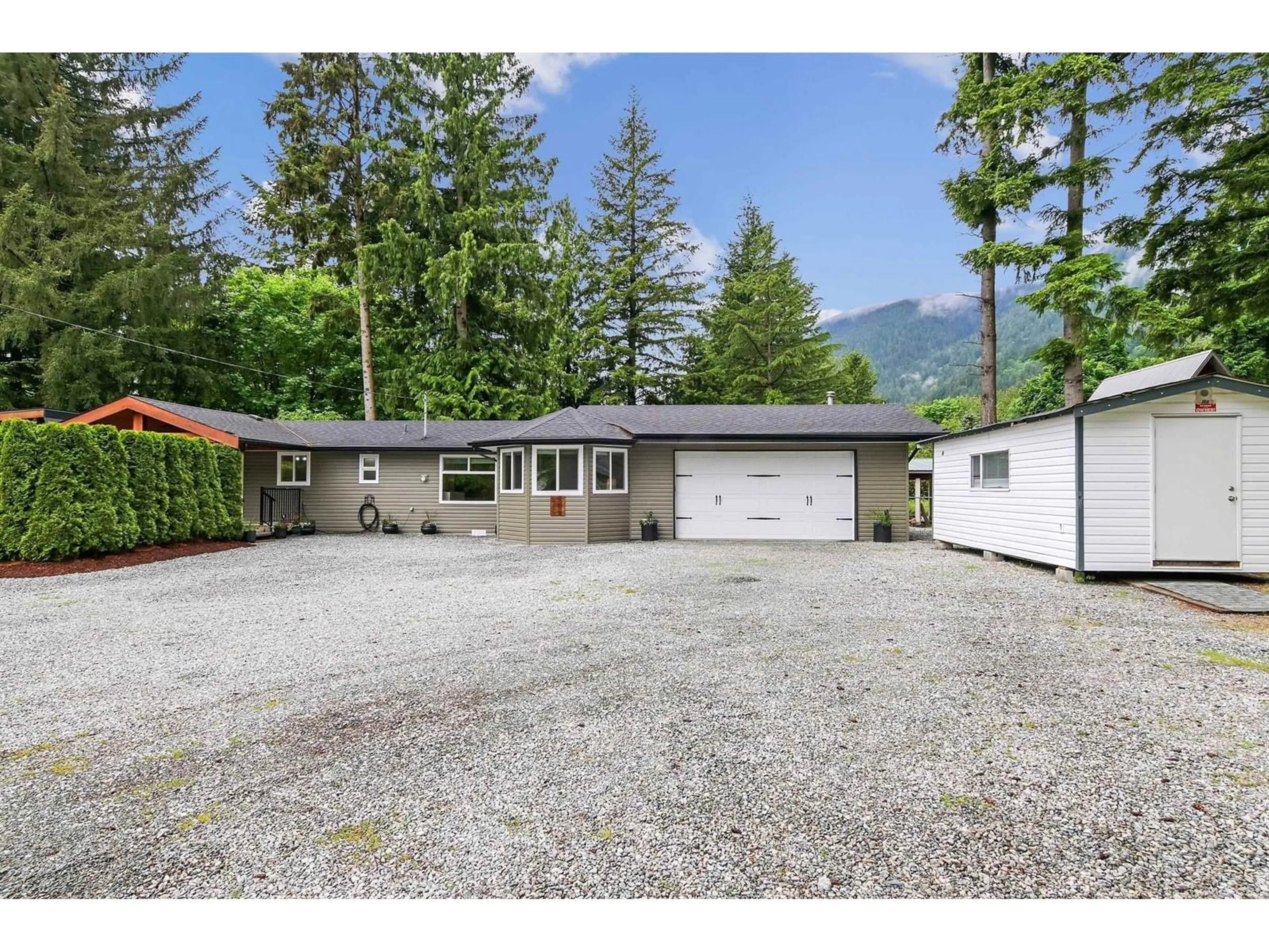 A pic from outside/outdoor area/front of a property/back of a property/a pic from drone, mountain view for 9633 HESS, Mission British Columbia V0M1H0