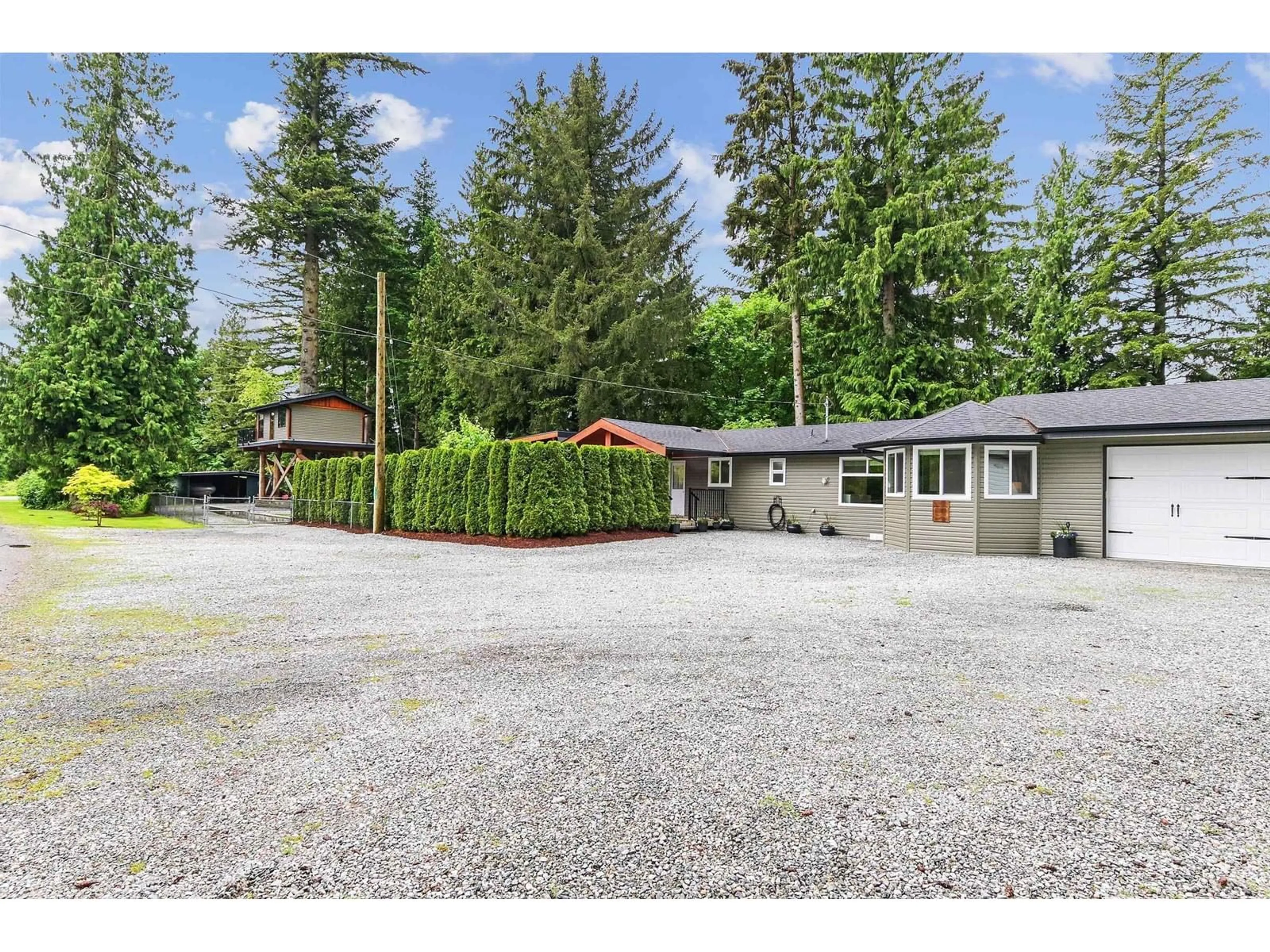 A pic from outside/outdoor area/front of a property/back of a property/a pic from drone, mountain view for 9633 HESS, Mission British Columbia V0M1H0