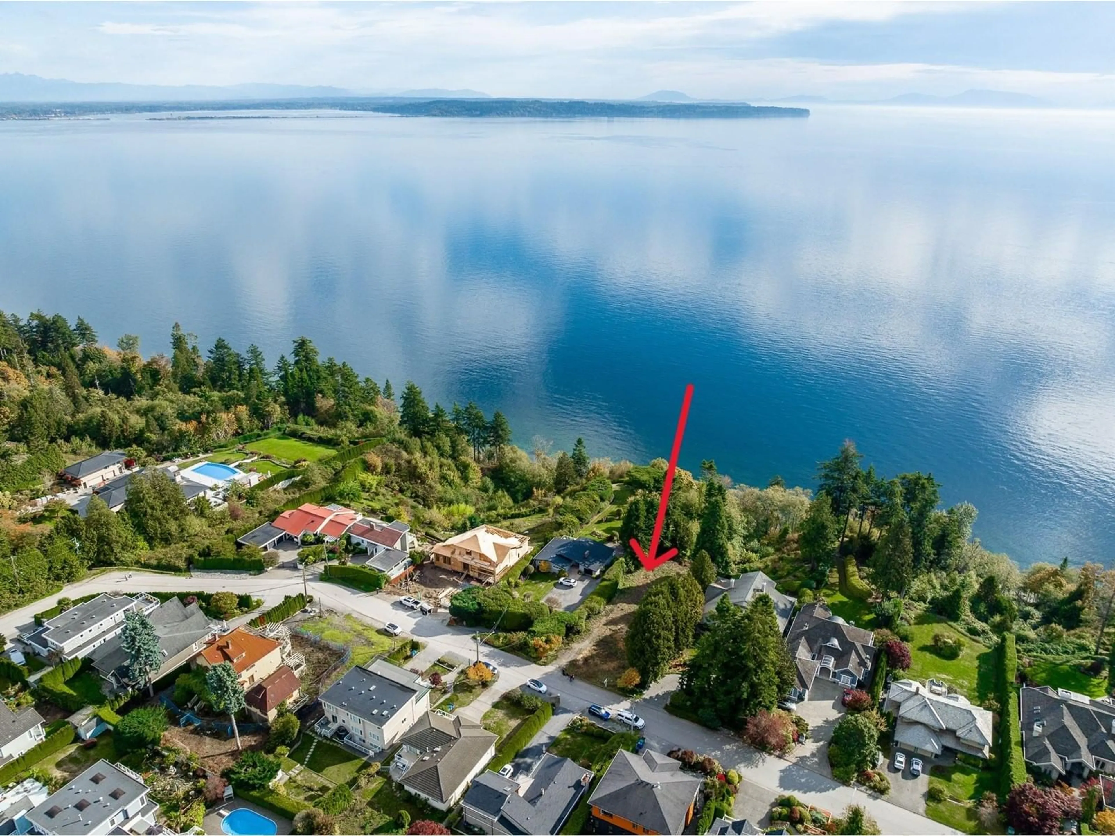 A pic from outside/outdoor area/front of a property/back of a property/a pic from drone, water/lake/river/ocean view for 13536 13A, Surrey British Columbia V4A1C4