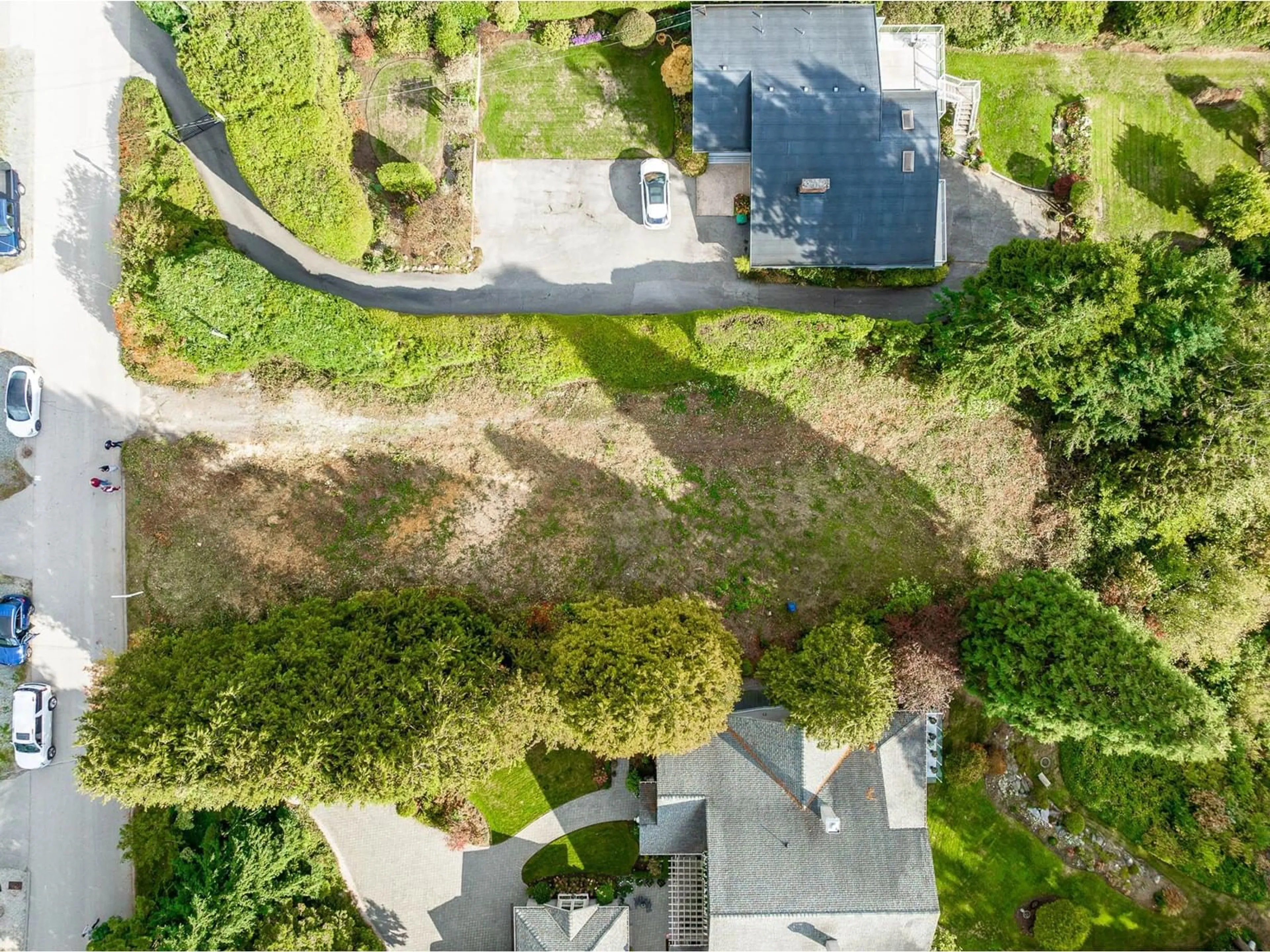 A pic from outside/outdoor area/front of a property/back of a property/a pic from drone, street for 13536 13A, Surrey British Columbia V4A1C4