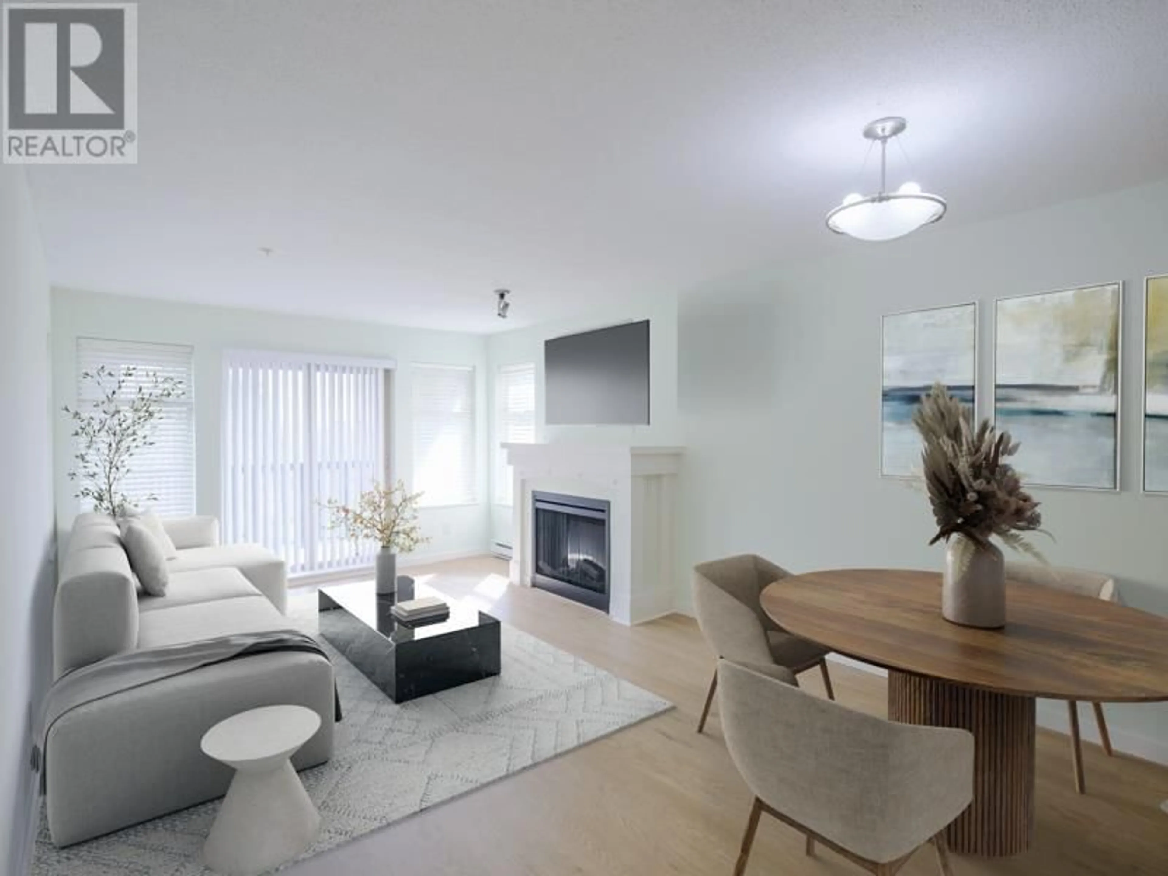 Living room with furniture, wood/laminate floor for 309 - 2998 SILVER SPRINGS BOULEVARD, Coquitlam British Columbia V3E3R7