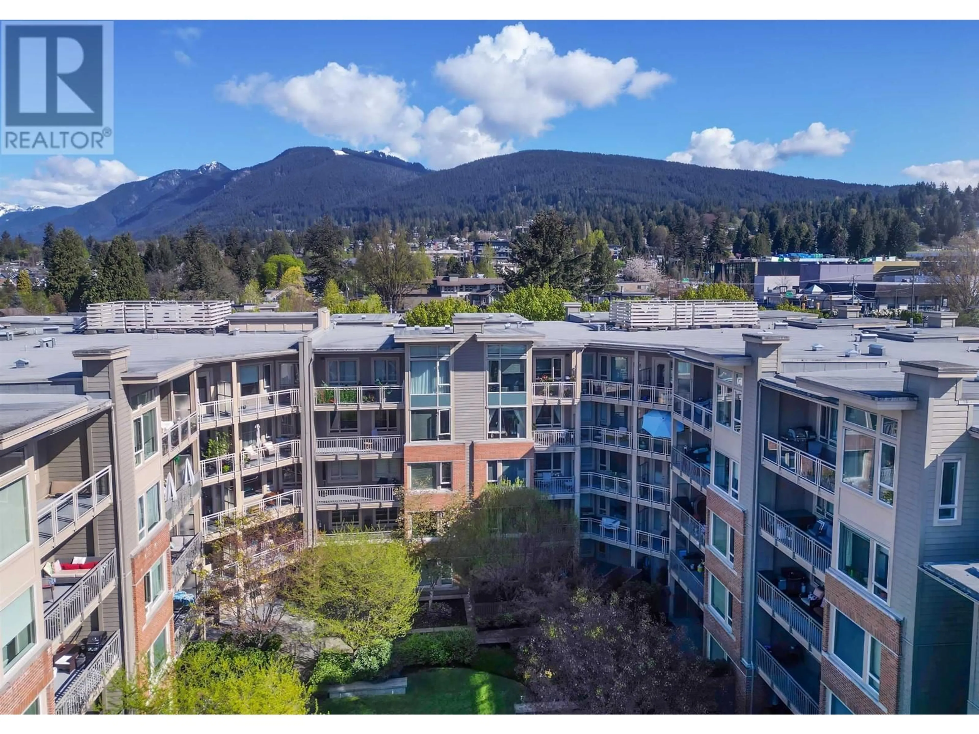 A pic from outside/outdoor area/front of a property/back of a property/a pic from drone, mountain view for 518 - 119 22ND STREET, North Vancouver British Columbia V7M0B4