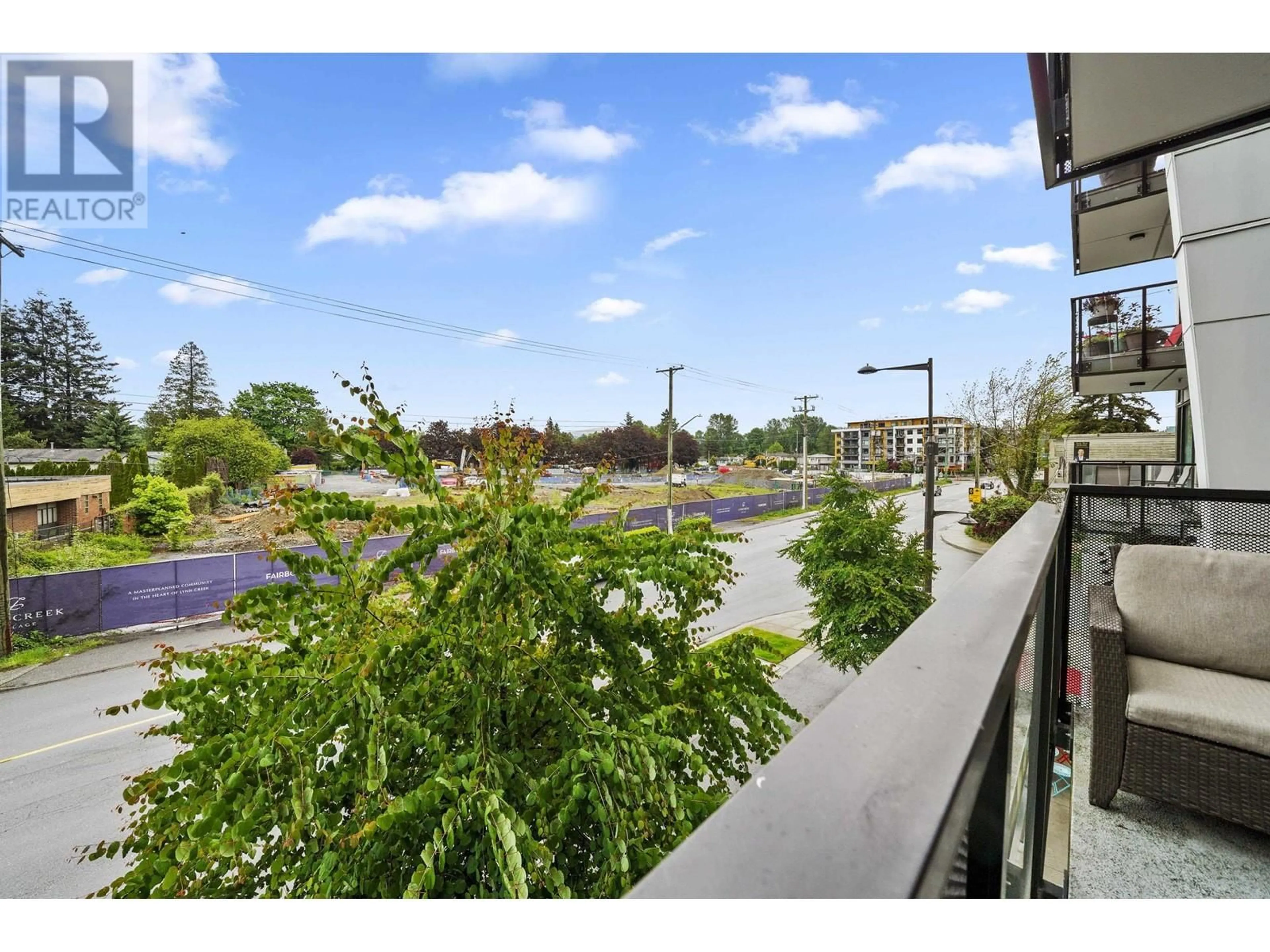 Patio, city buildings view from balcony for 208 - 1496 CHARLOTTE ROAD, North Vancouver British Columbia V7J0C9
