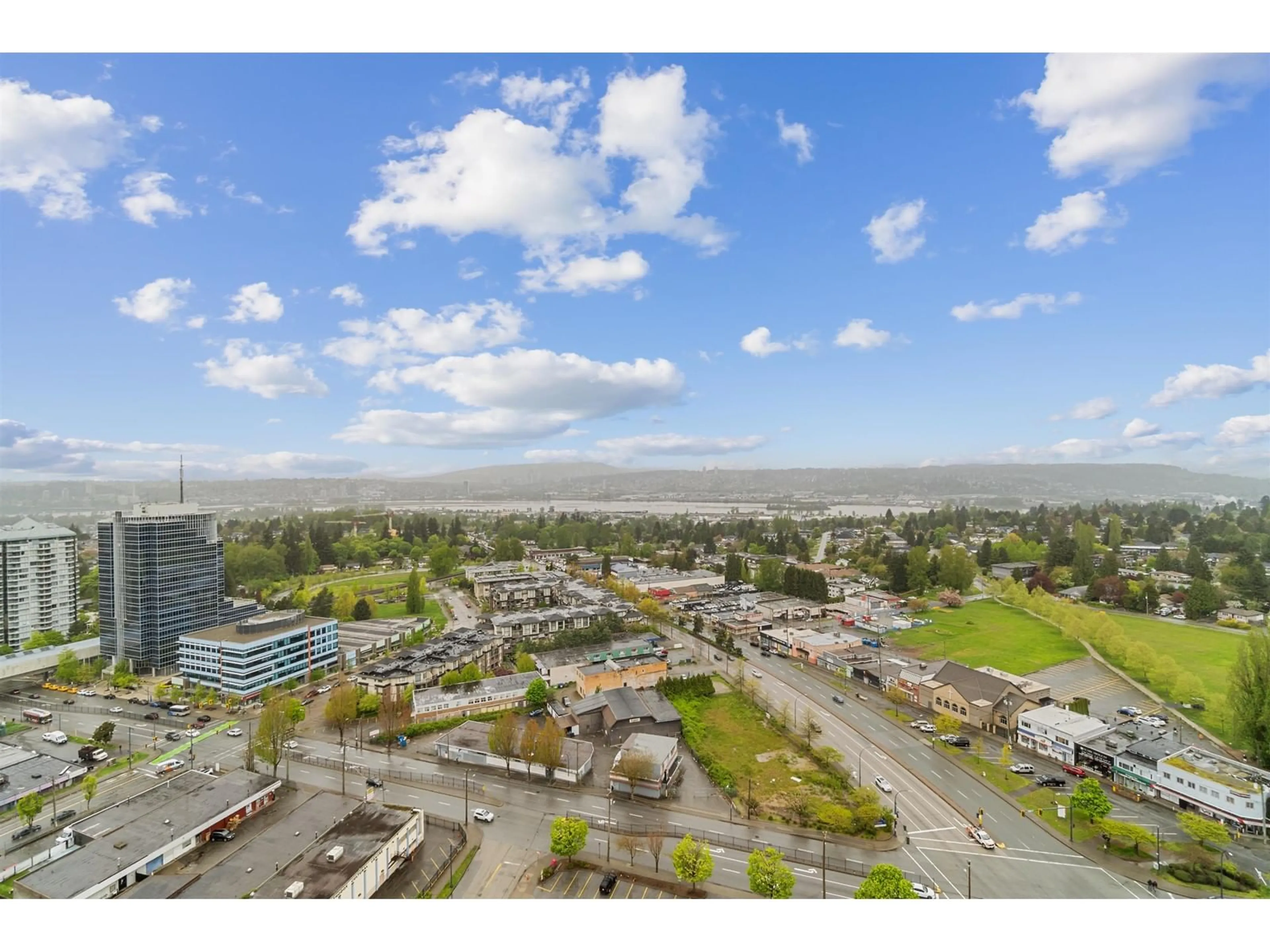 A pic from outside/outdoor area/front of a property/back of a property/a pic from drone, unknown for 2402 - 10750 135A, Surrey British Columbia V3T0A4