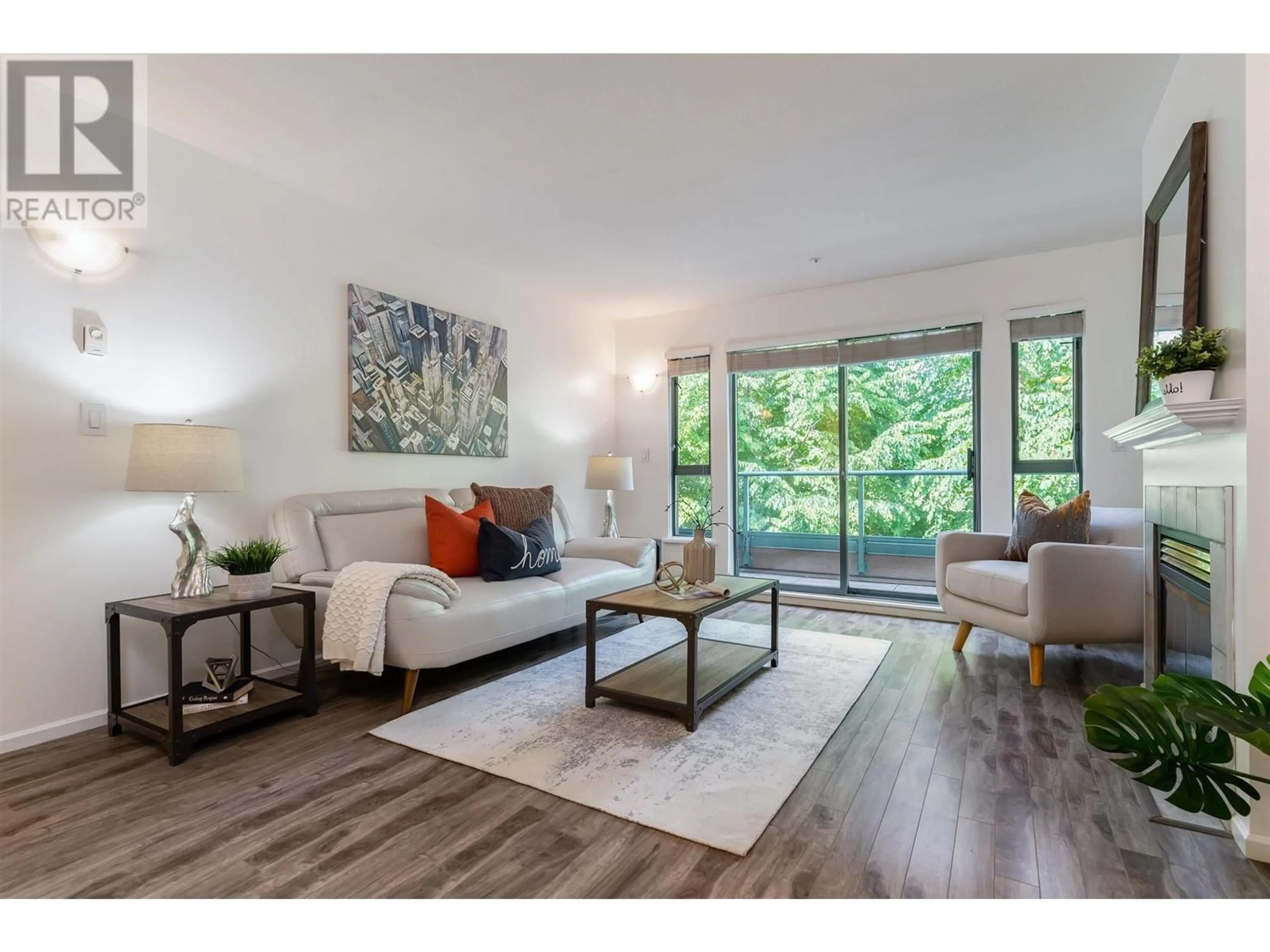 Living room with furniture, wood/laminate floor for PH12 - 223 MOUNTAIN HIGHWAY, North Vancouver British Columbia V7J3V3