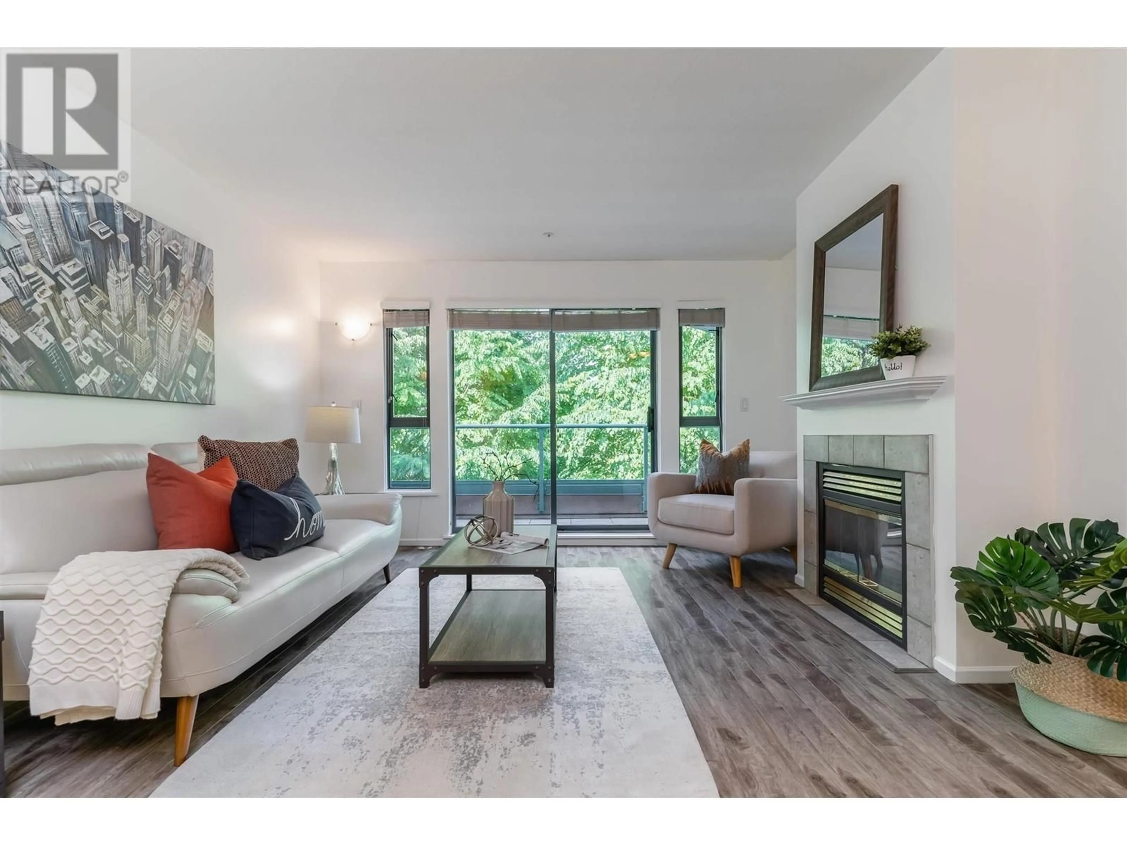 Living room with furniture, wood/laminate floor for PH12 - 223 MOUNTAIN HIGHWAY, North Vancouver British Columbia V7J3V3