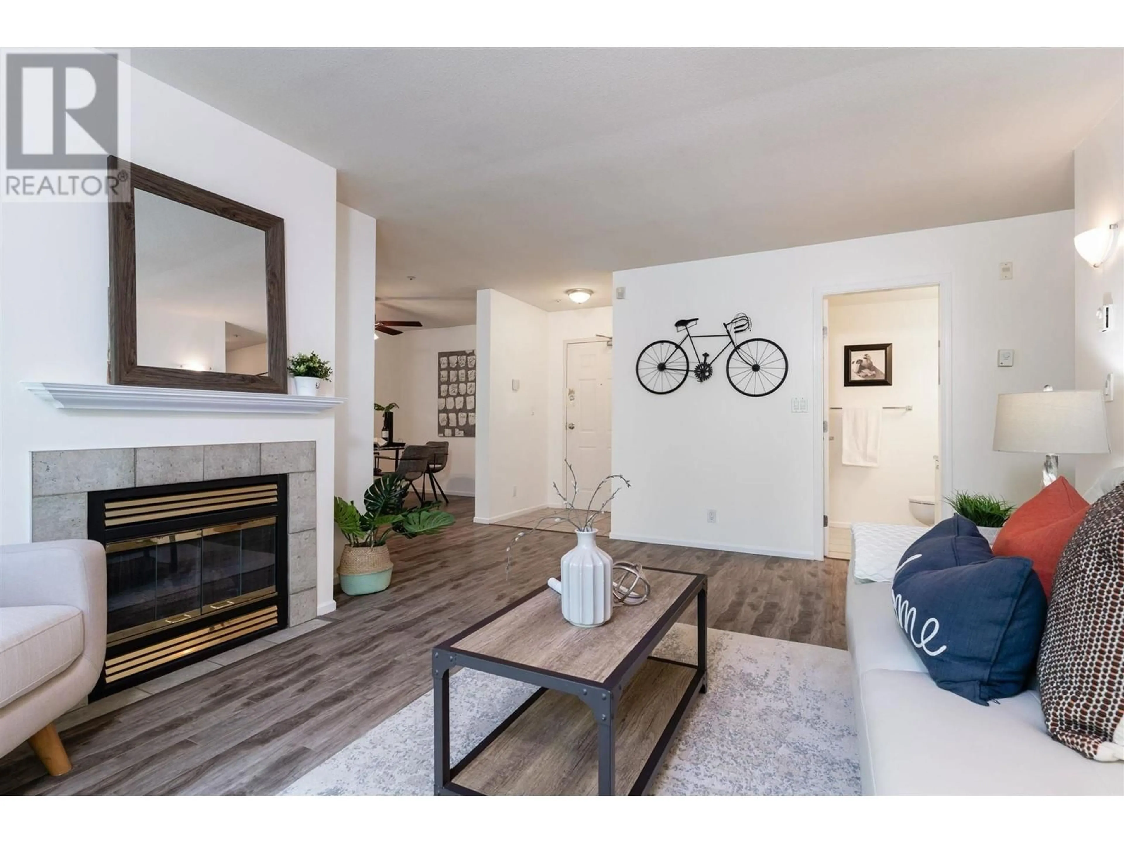 Living room with furniture, wood/laminate floor for PH12 - 223 MOUNTAIN HIGHWAY, North Vancouver British Columbia V7J3V3
