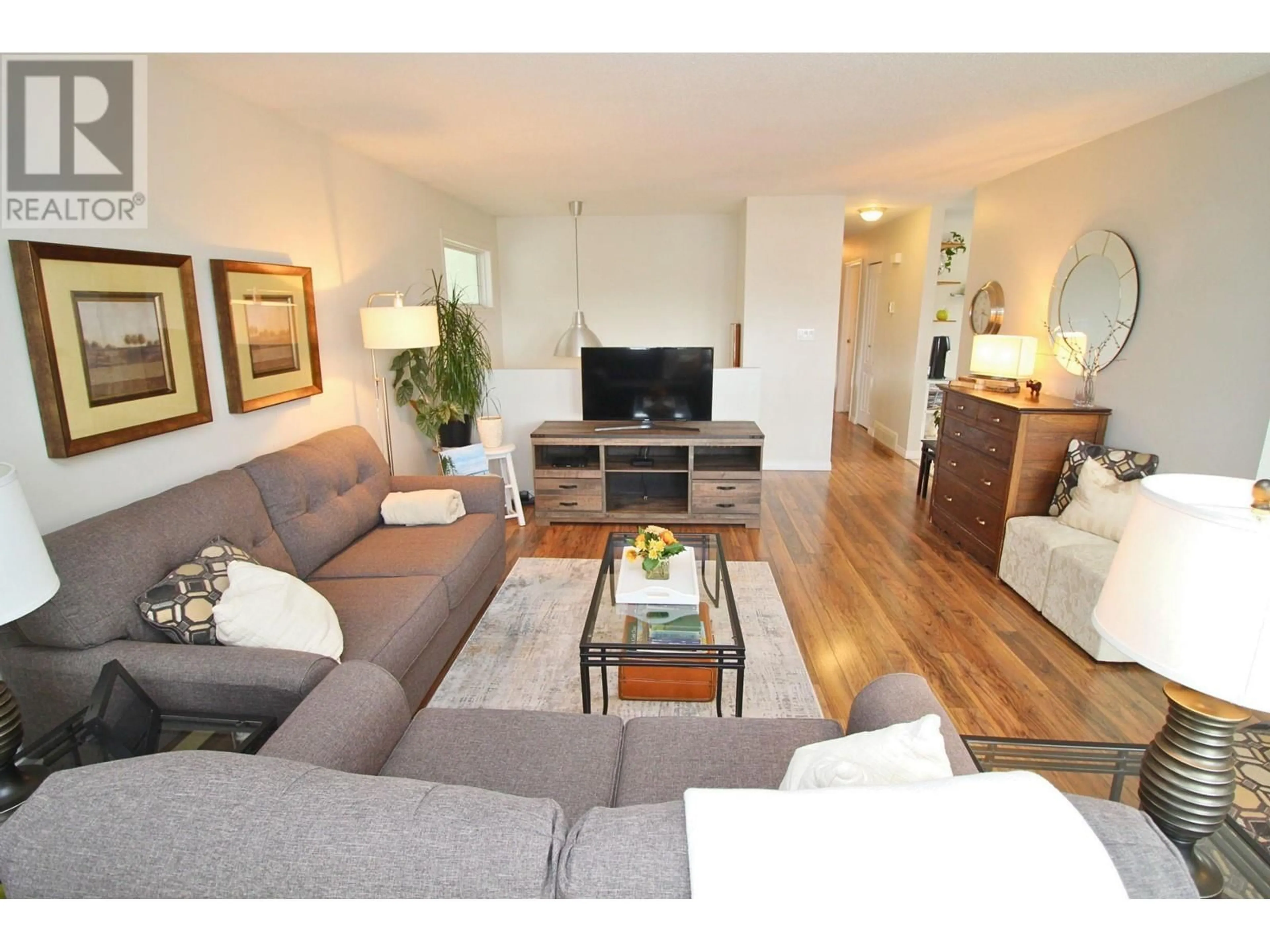Living room with furniture, wood/laminate floor for 1960 SULLIVAN WAY, Houston British Columbia V0J1Z0