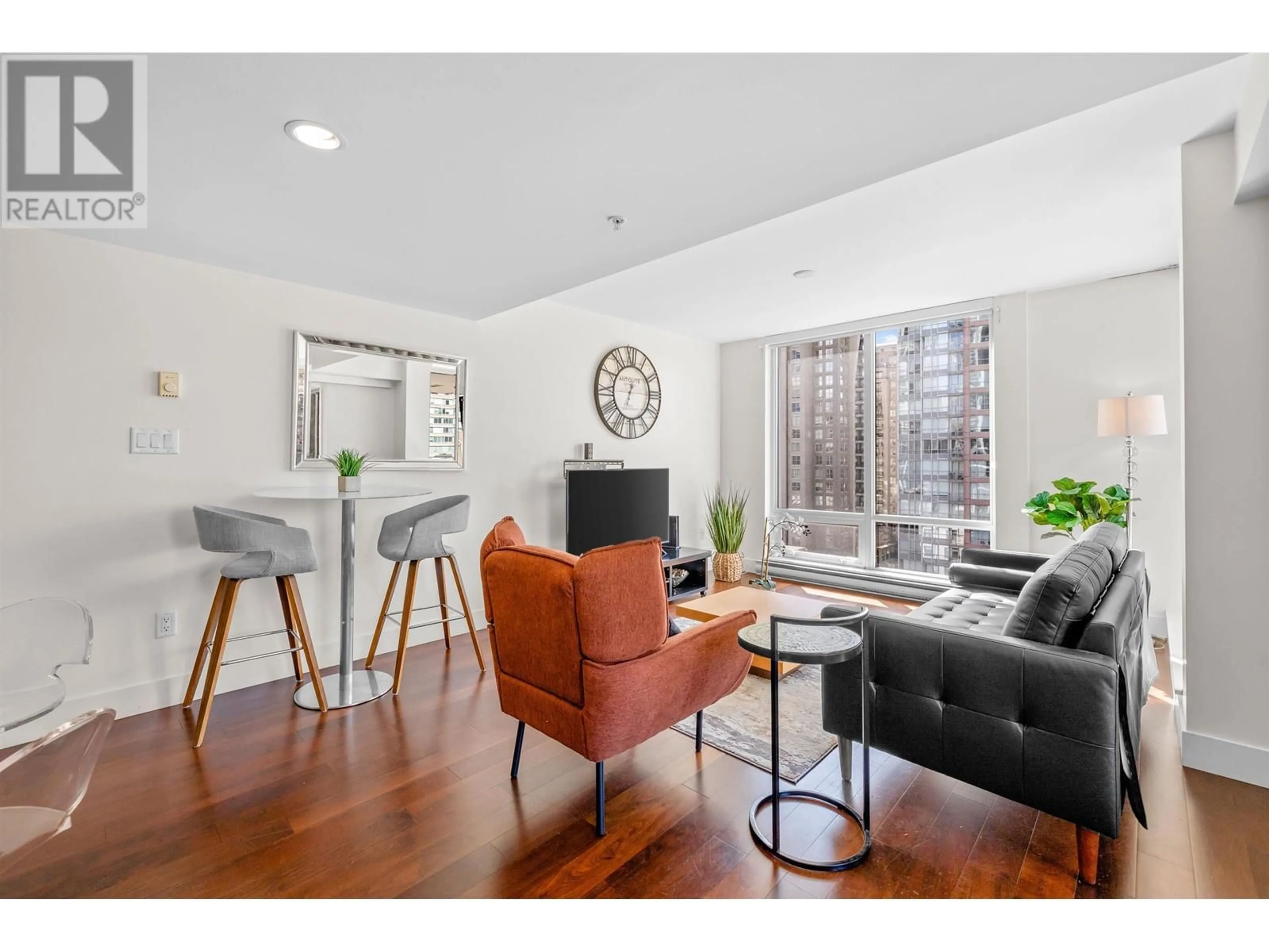 Living room with furniture, wood/laminate floor for 804 - 565 SMITHE STREET, Vancouver British Columbia V6B0E4