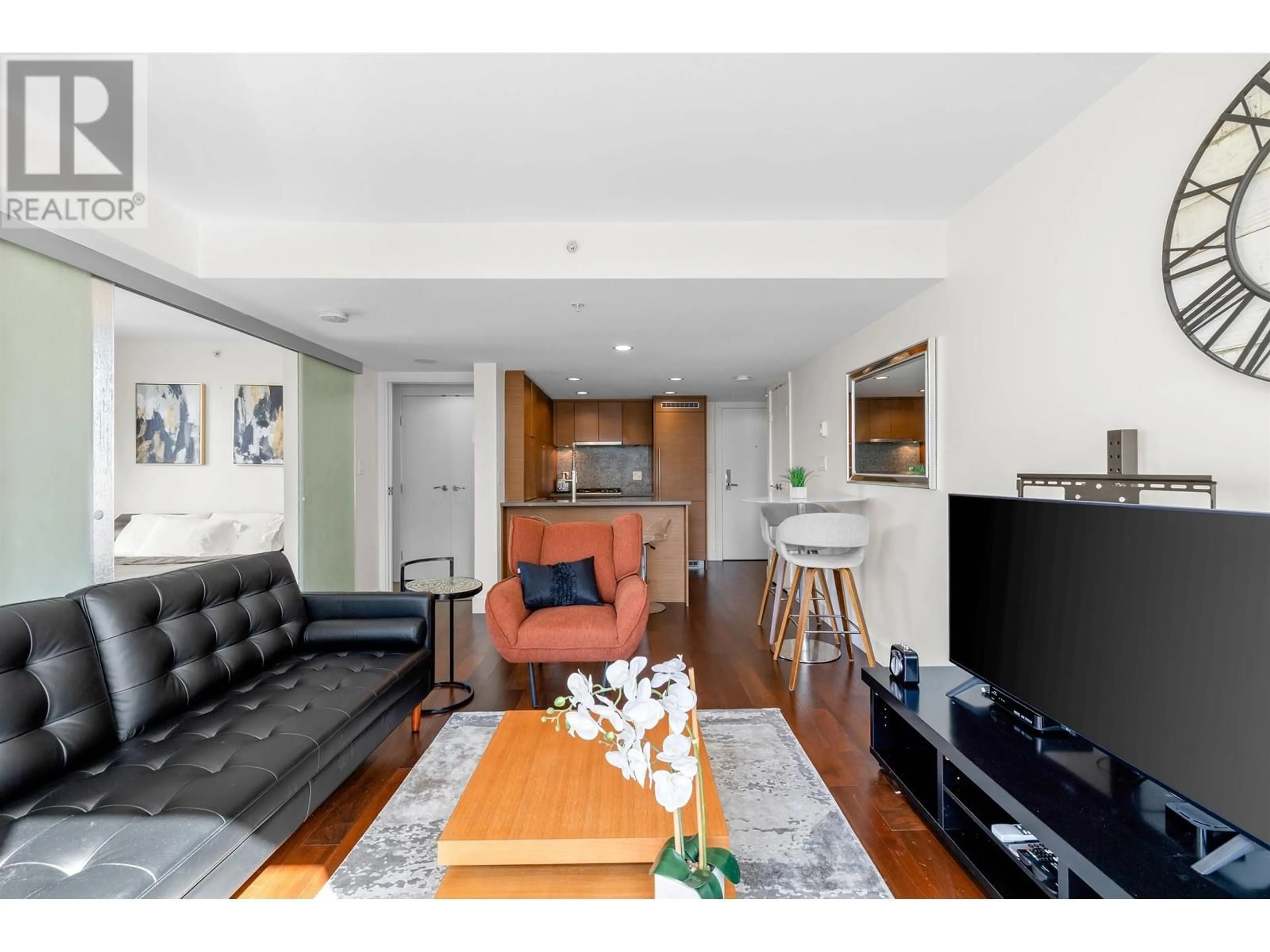 Living room with furniture, wood/laminate floor for 804 - 565 SMITHE STREET, Vancouver British Columbia V6B0E4