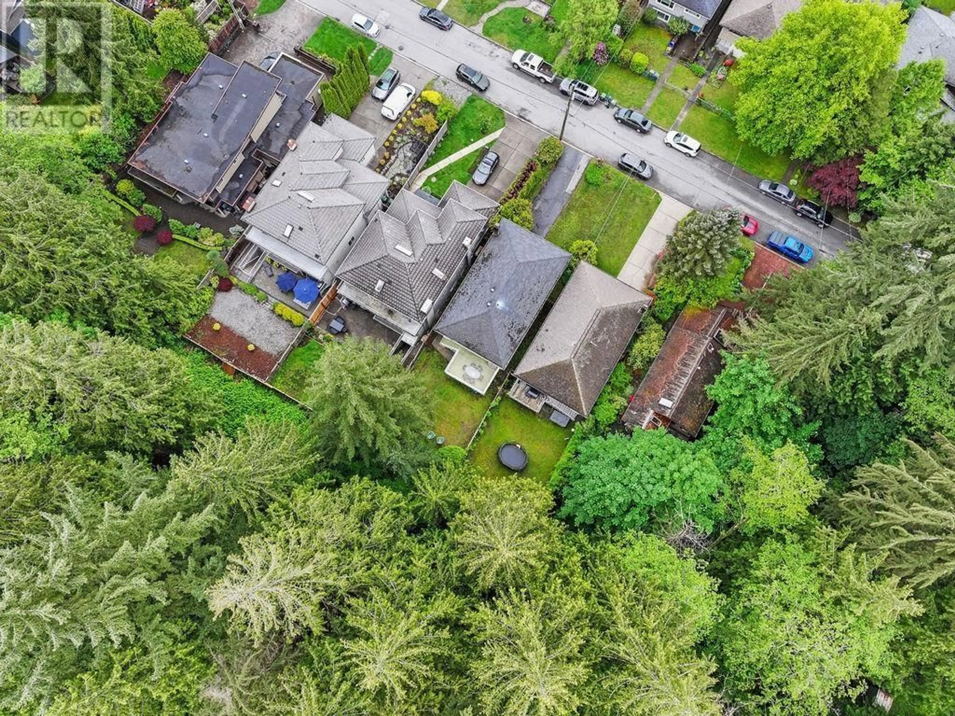 A pic from outside/outdoor area/front of a property/back of a property/a pic from drone, forest/trees view for 1560 BURRILL AVENUE, North Vancouver British Columbia V7K1L9