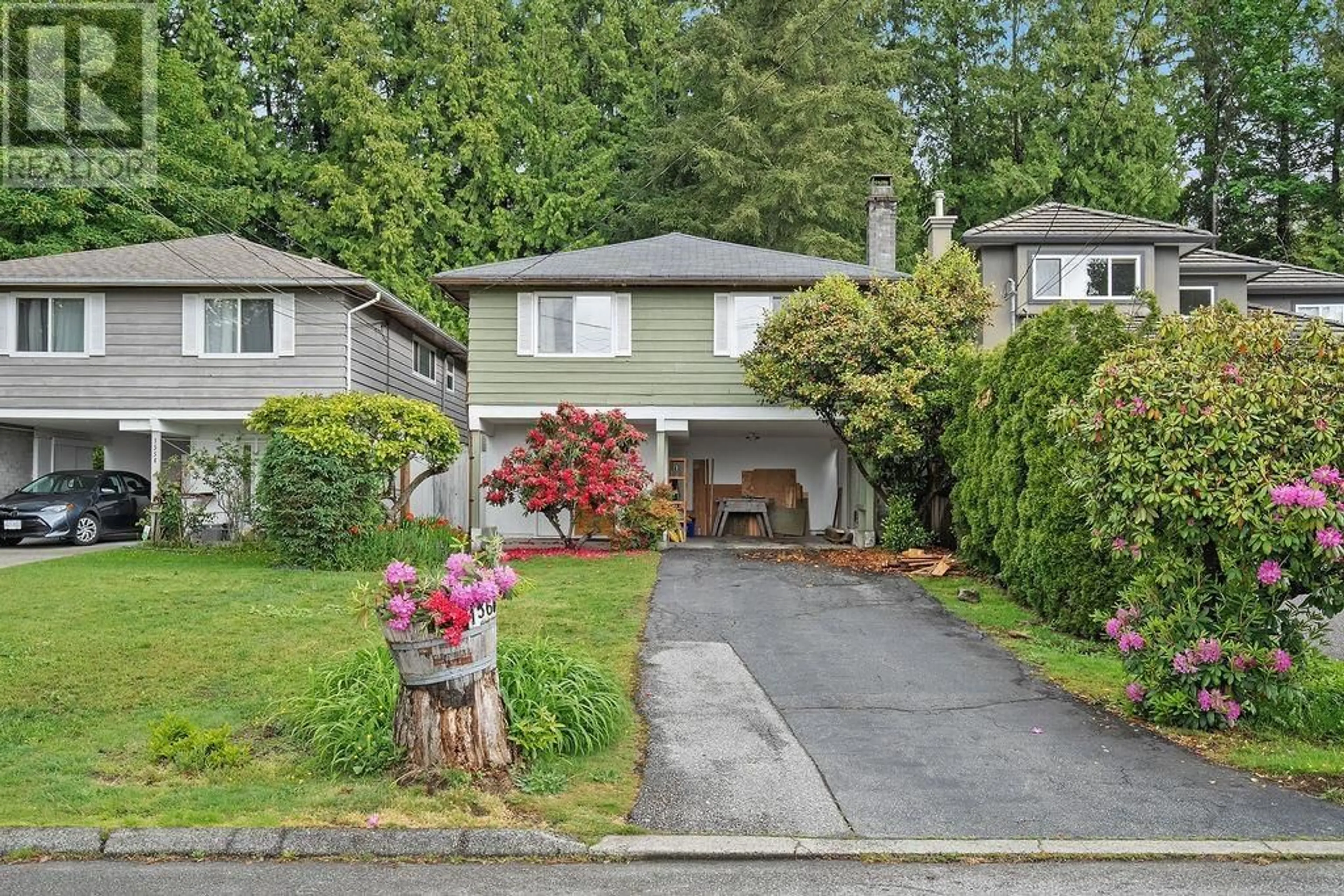 Home with vinyl exterior material, street for 1560 BURRILL AVENUE, North Vancouver British Columbia V7K1L9