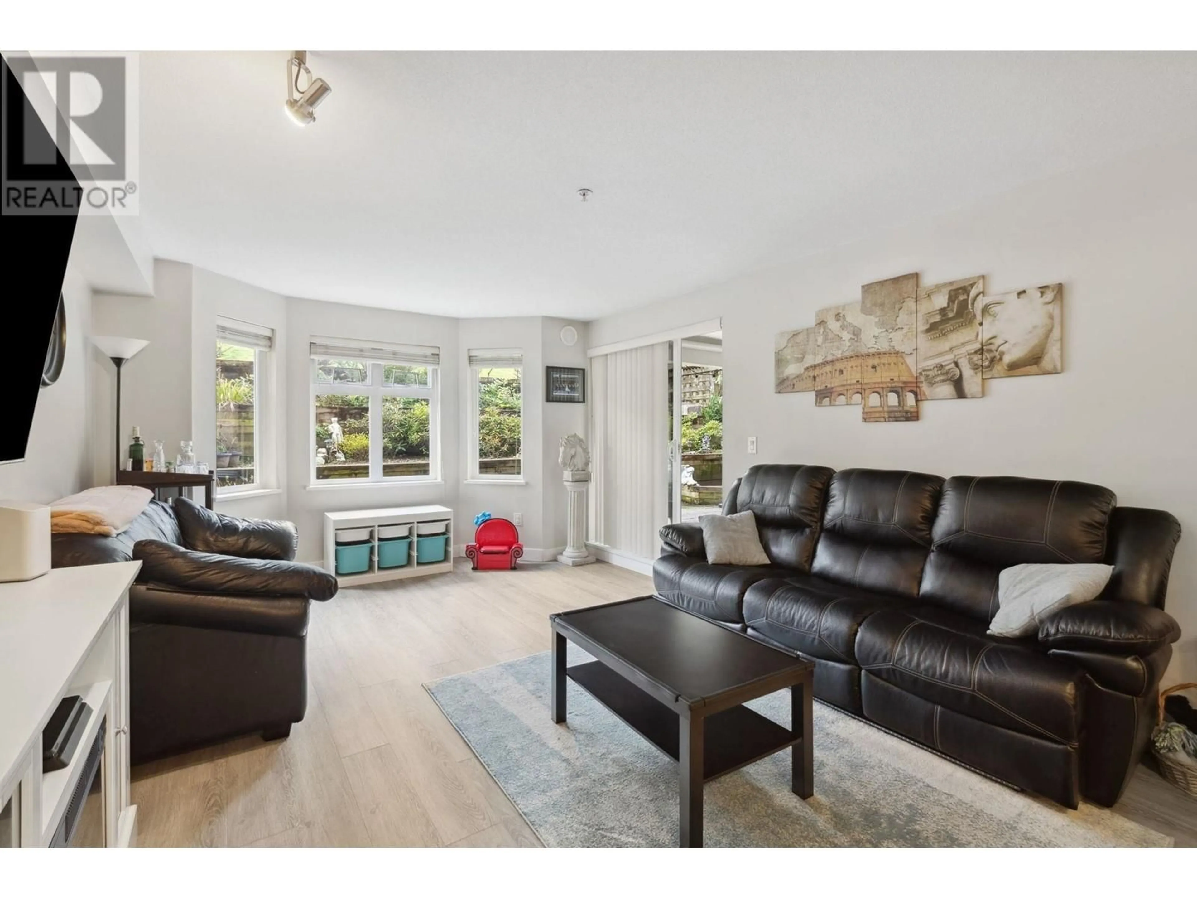 Living room with furniture, unknown for 310 - 160 SHORELINE CIRCLE, Port Moody British Columbia V3H0B2