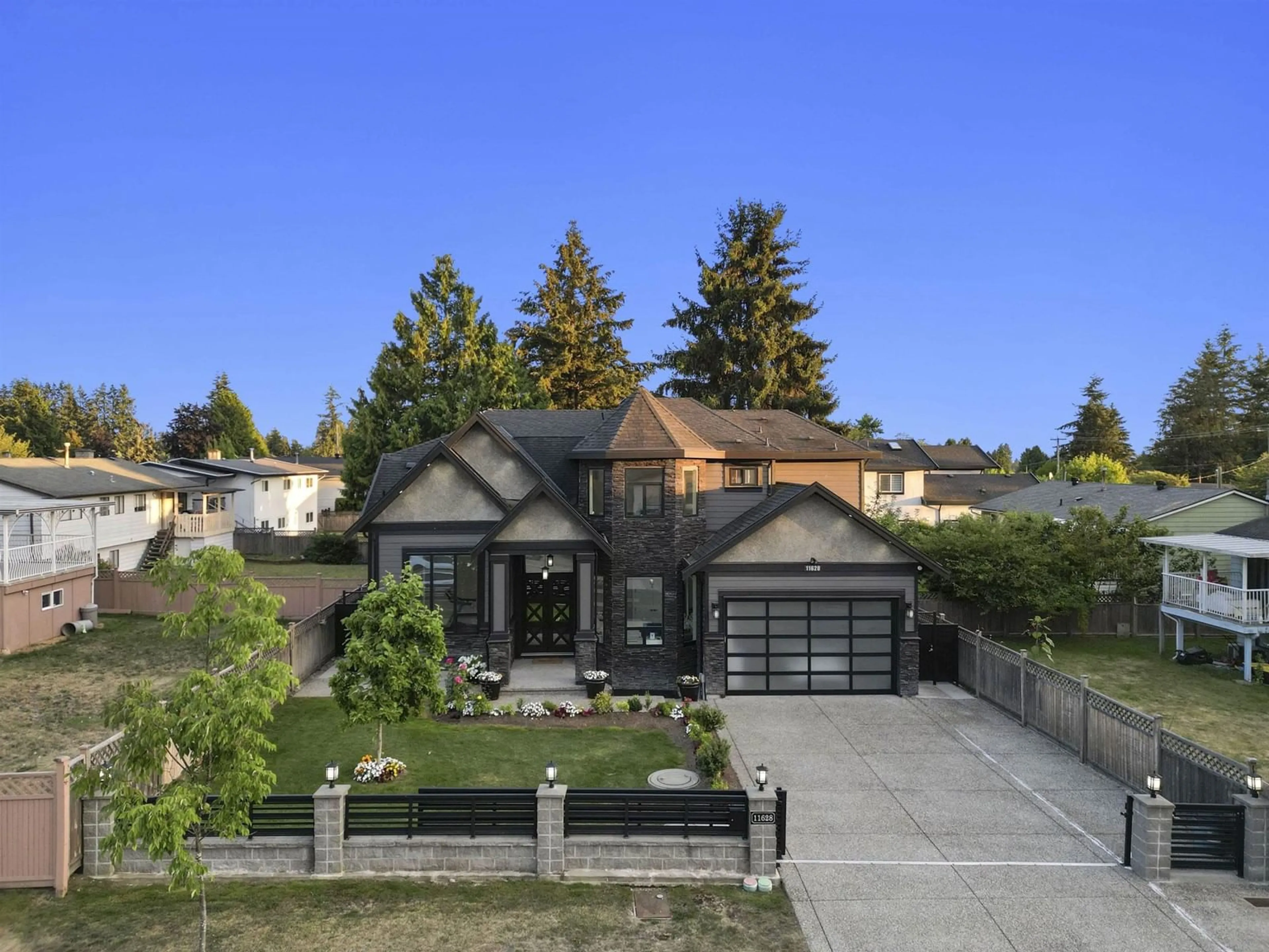 A pic from outside/outdoor area/front of a property/back of a property/a pic from drone, street for 11628 78A, Delta British Columbia V4C6V8
