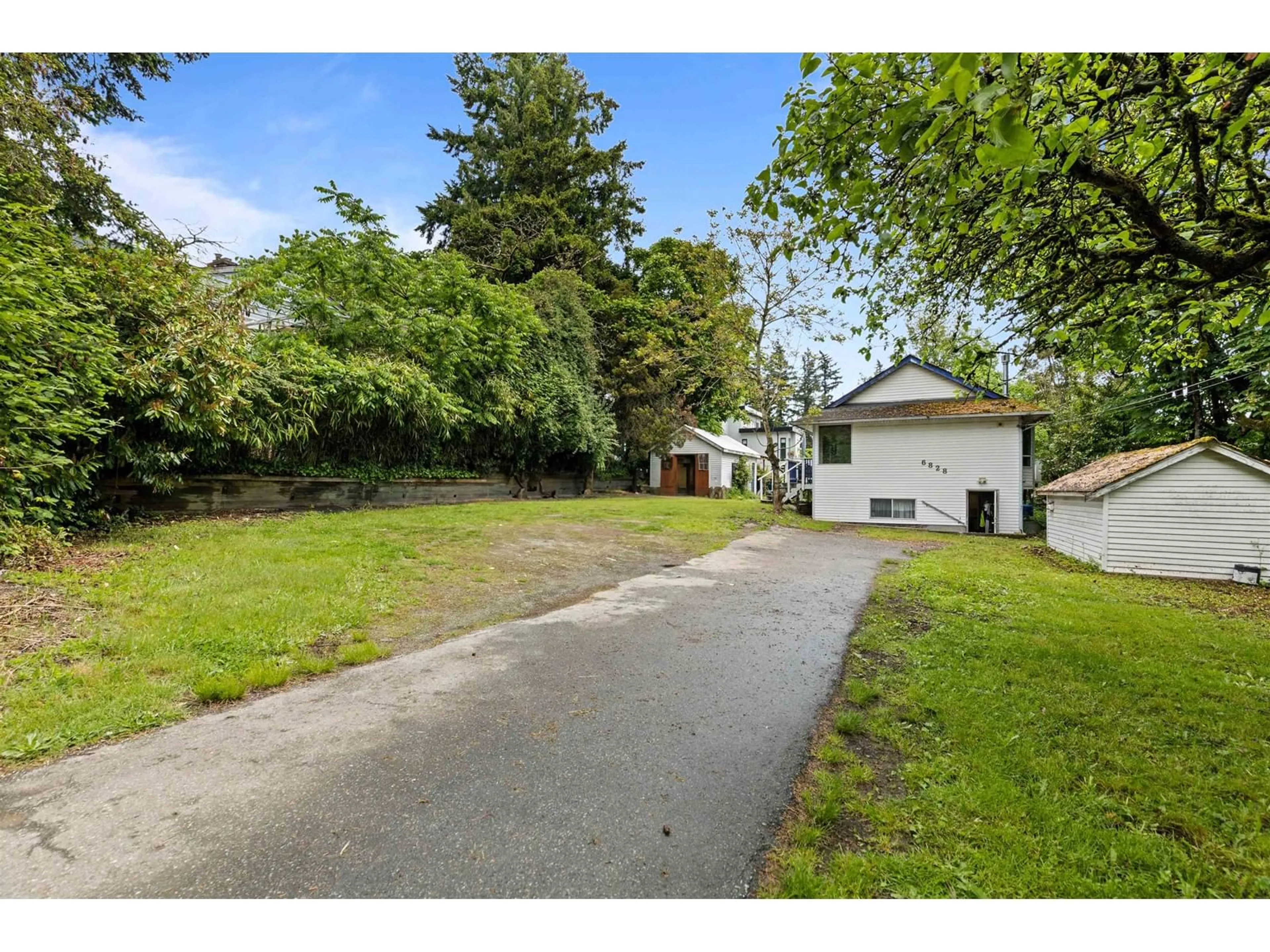 A pic from outside/outdoor area/front of a property/back of a property/a pic from drone, street for 6828 144, Surrey British Columbia V3W5R7