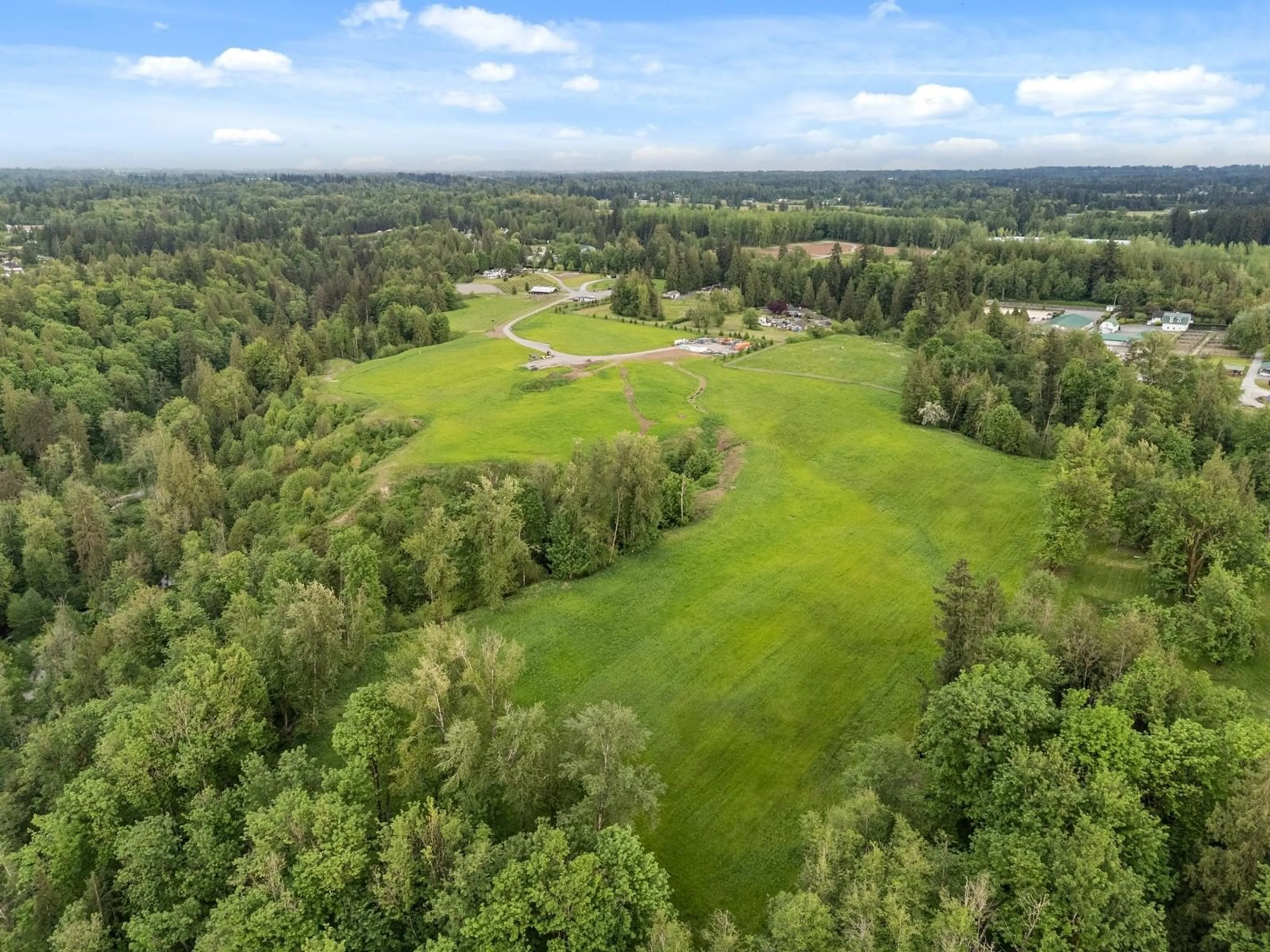 A pic from outside/outdoor area/front of a property/back of a property/a pic from drone, forest/trees view for 25125 72, Langley British Columbia V4W1J1