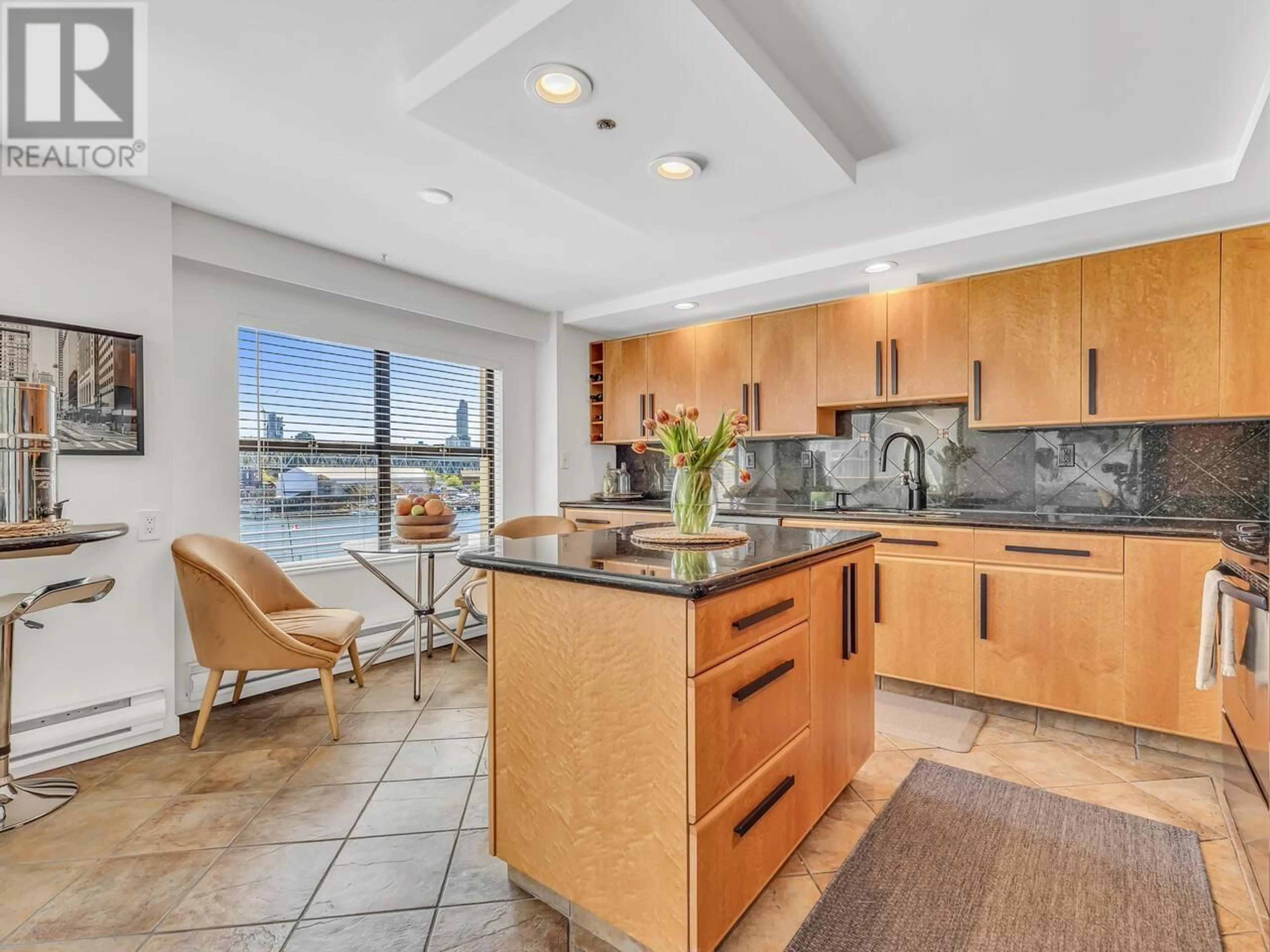 Open concept kitchen, ceramic/tile floor for 402 - 1010 BEACH AVENUE, Vancouver British Columbia V6E1T7