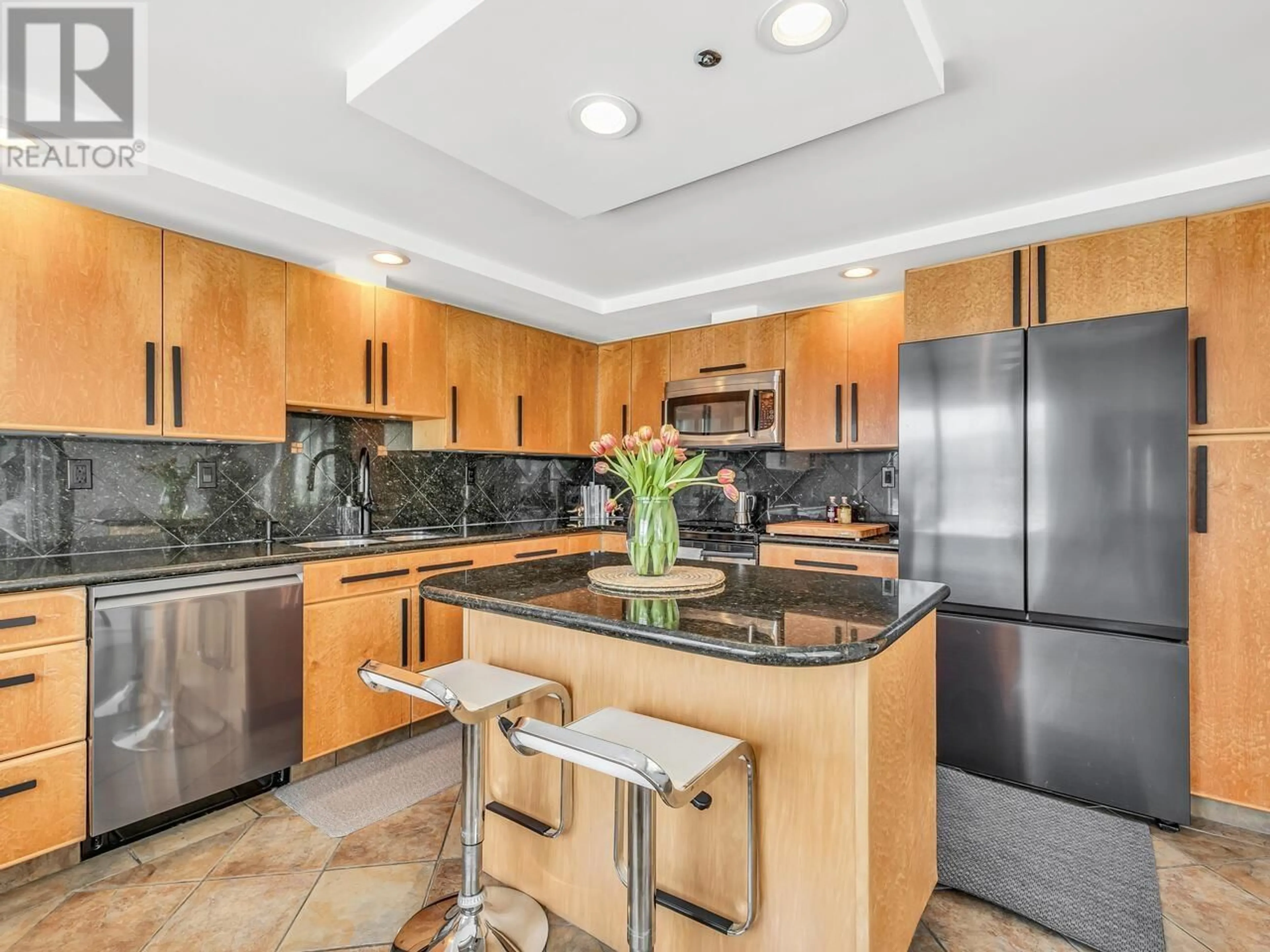 Open concept kitchen, ceramic/tile floor for 402 - 1010 BEACH AVENUE, Vancouver British Columbia V6E1T7