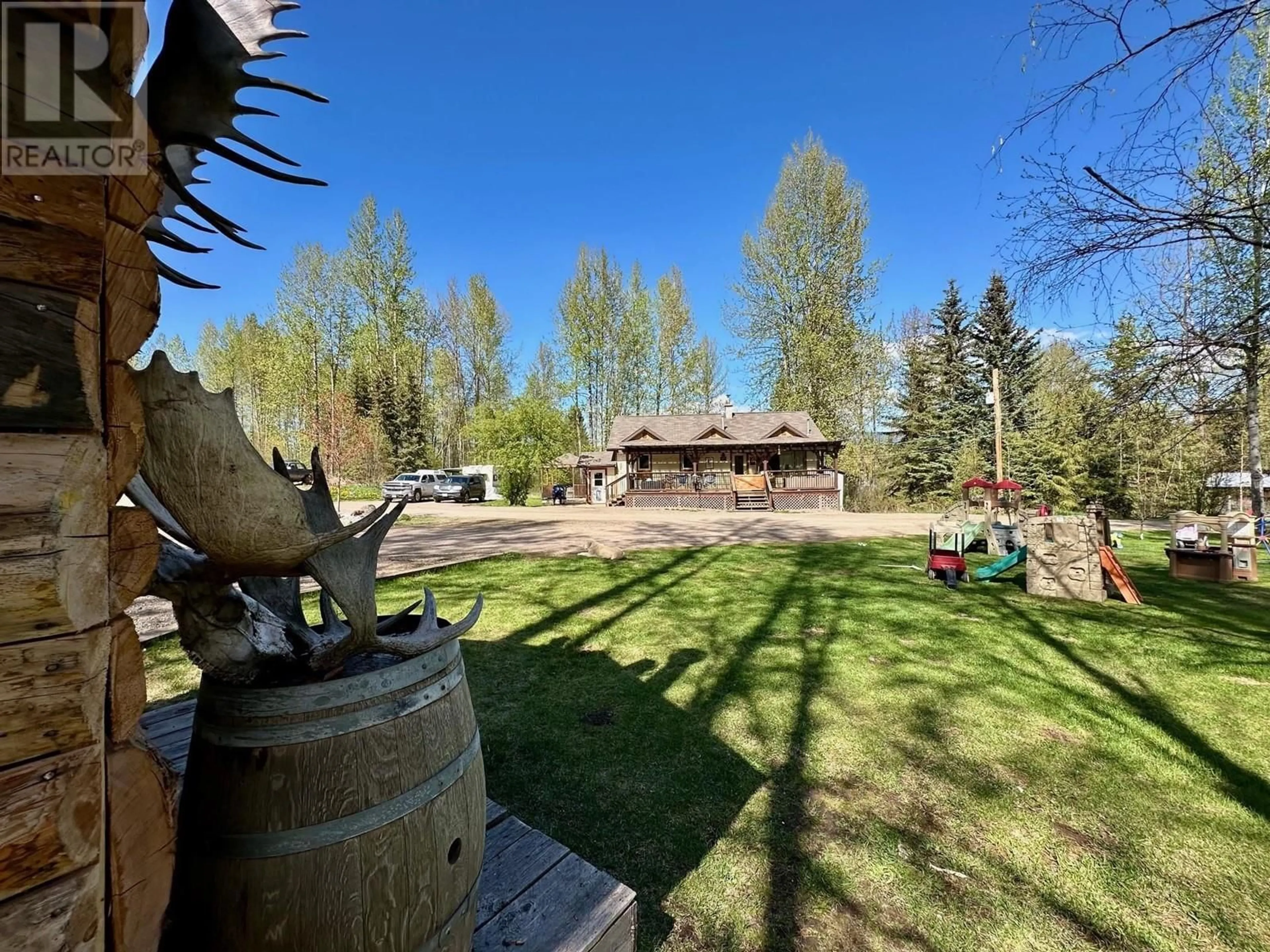 A pic from outside/outdoor area/front of a property/back of a property/a pic from drone, unknown for 5142 SLACK ROAD, Smithers British Columbia V0J2N0