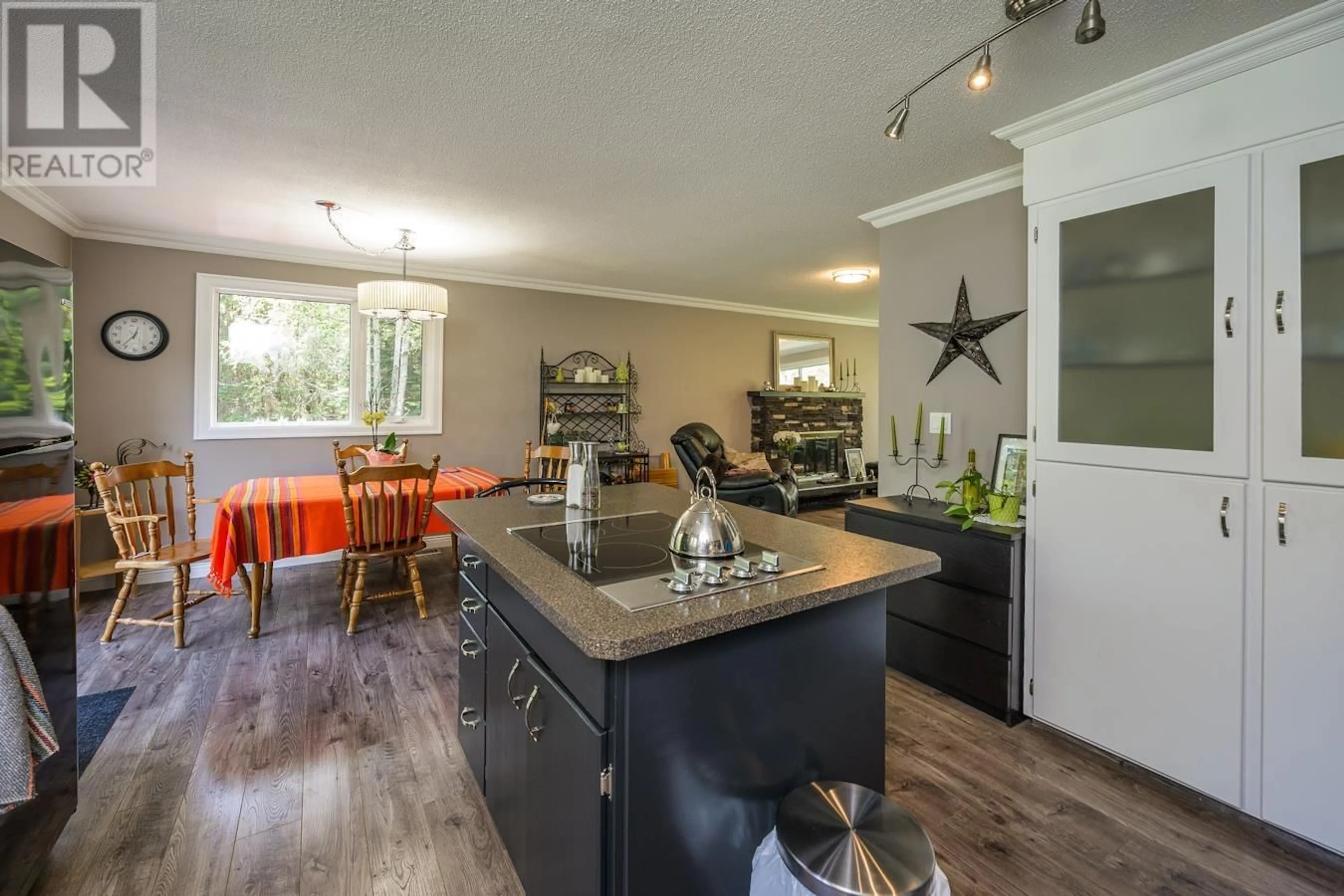 Open concept kitchen, wood/laminate floor for 8880 FOX DRIVE, Prince George British Columbia V2K5H4