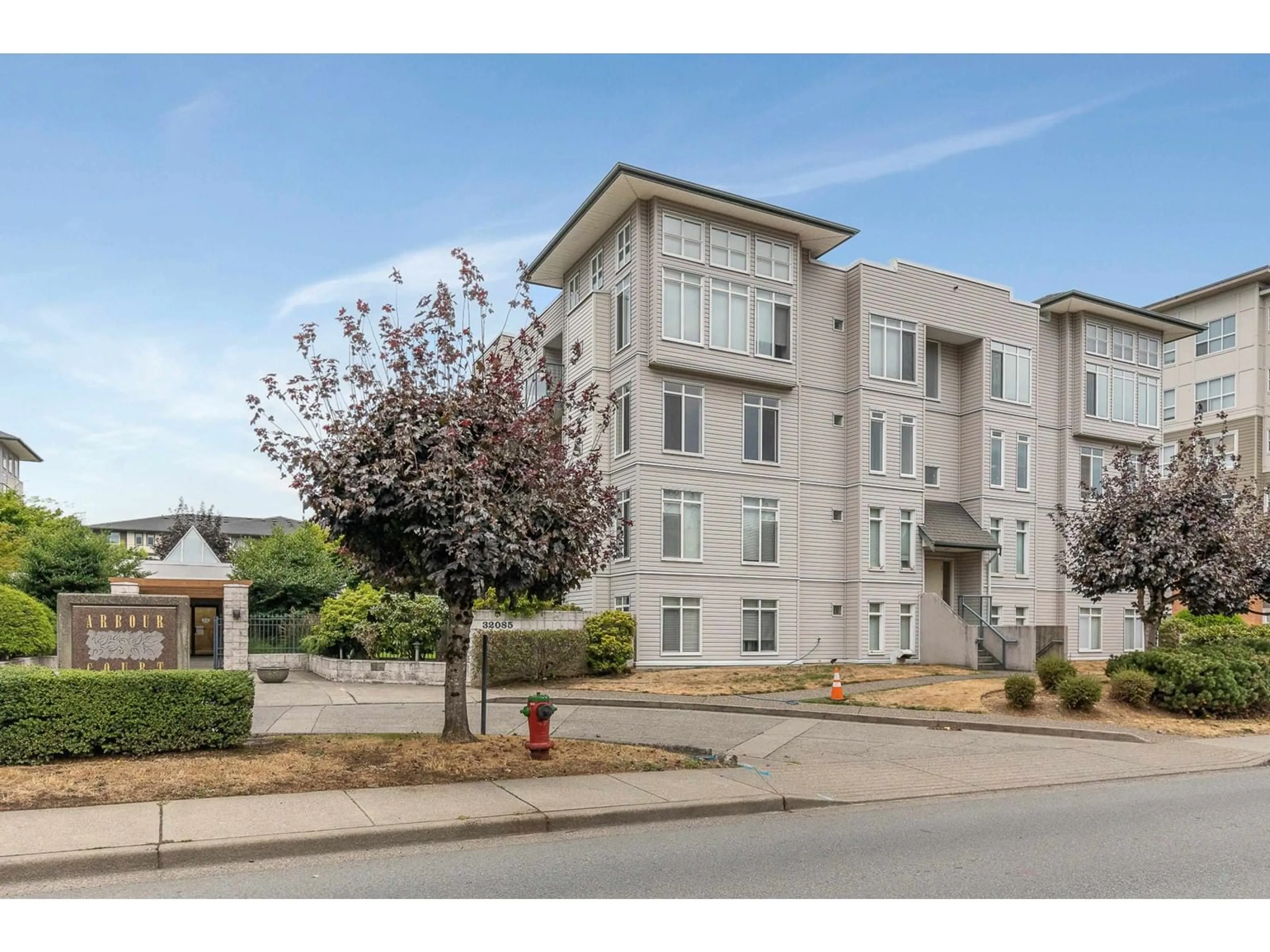 A pic from outside/outdoor area/front of a property/back of a property/a pic from drone, unknown for 411 - 32085 GEORGE FERGUSON, Abbotsford British Columbia V2T2K7
