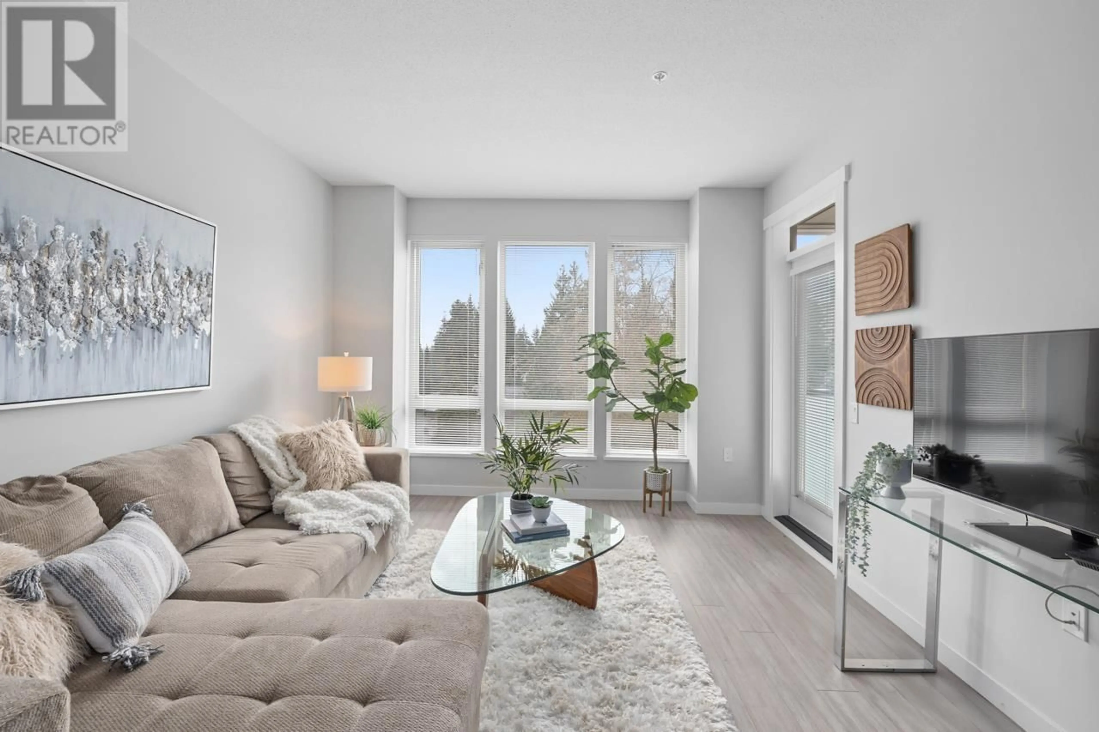 Living room with furniture, unknown for 410 - 2632 LIBRARY LANE, North Vancouver British Columbia V7J0B8