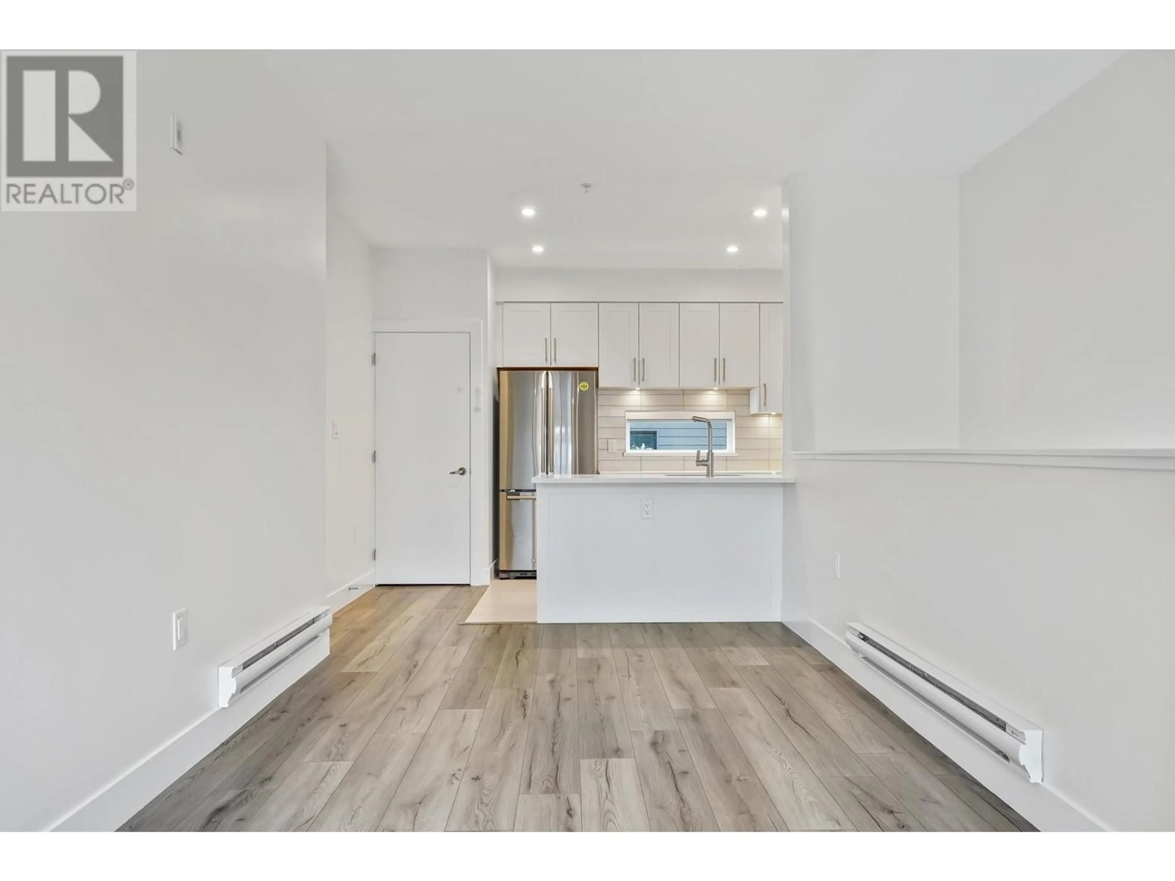Open concept kitchen, wood/laminate floor for 510 - 218 CARNARVON STREET, New Westminster British Columbia V3L1B8