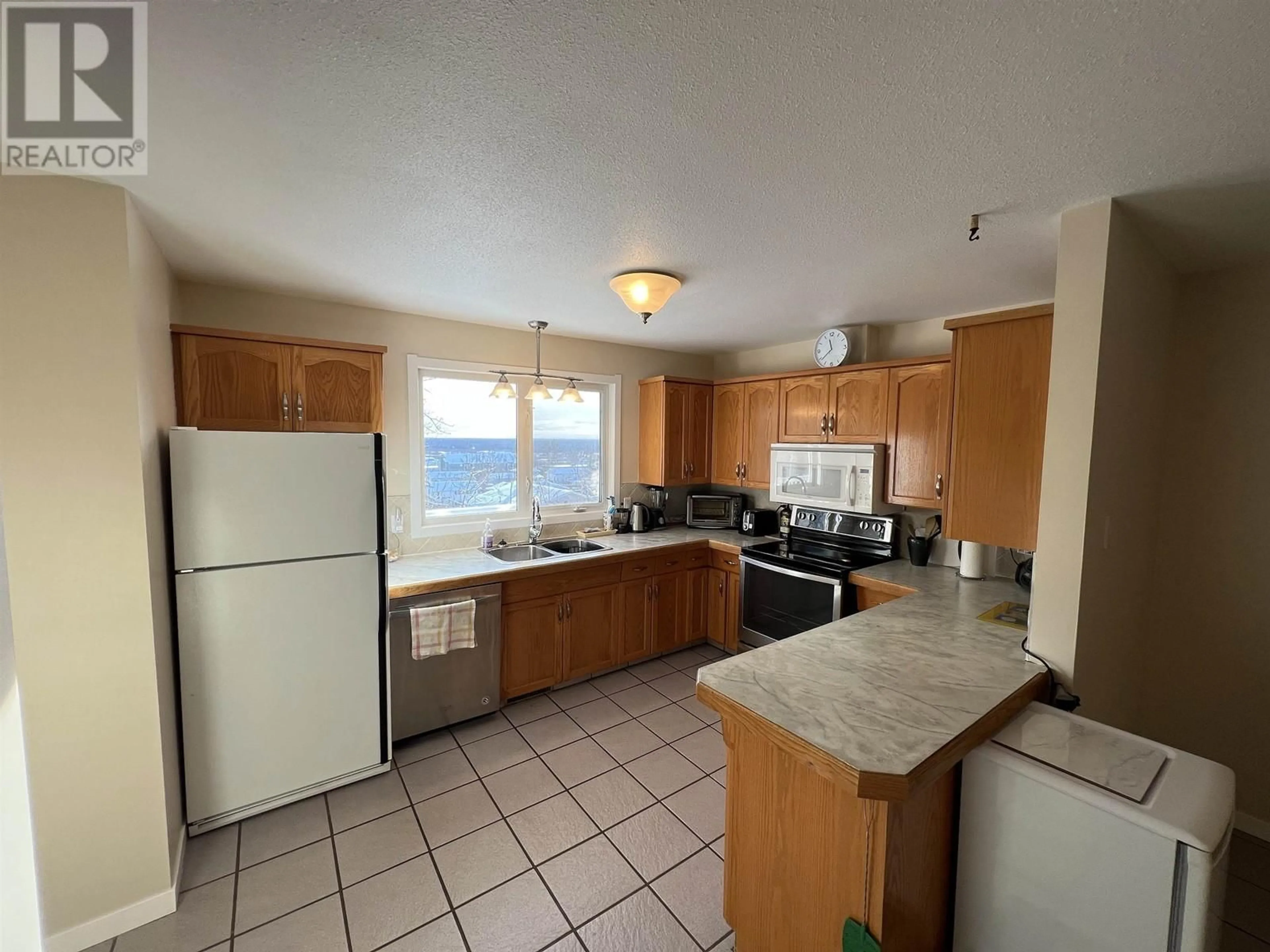 Standard kitchen, ceramic/tile floor for 5324 51 STREET, Fort Nelson British Columbia V0C1R0