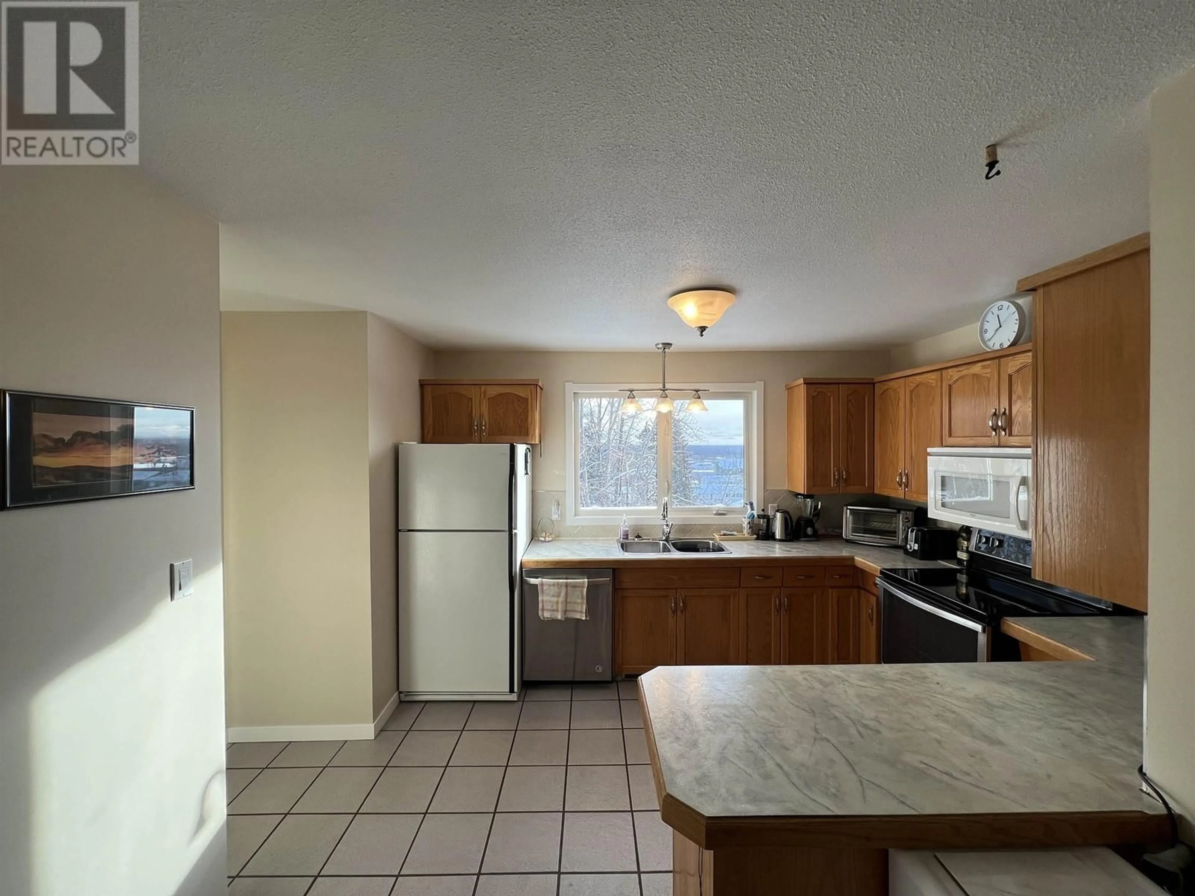 Standard kitchen, ceramic/tile floor for 5324 51 STREET, Fort Nelson British Columbia V0C1R0