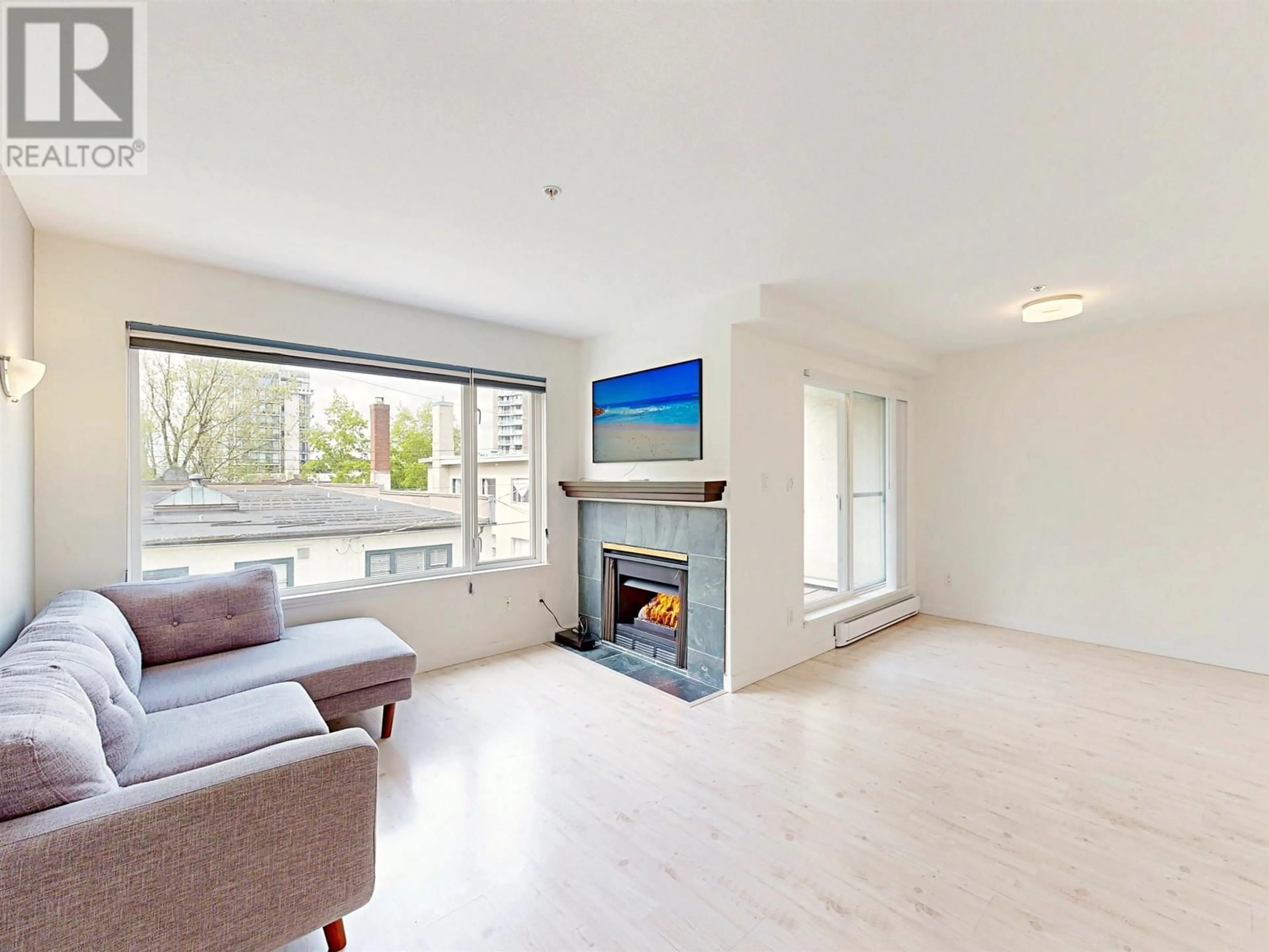 Living room with furniture, unknown for 205 - 1554 BURNABY STREET, Vancouver British Columbia V6G1W9