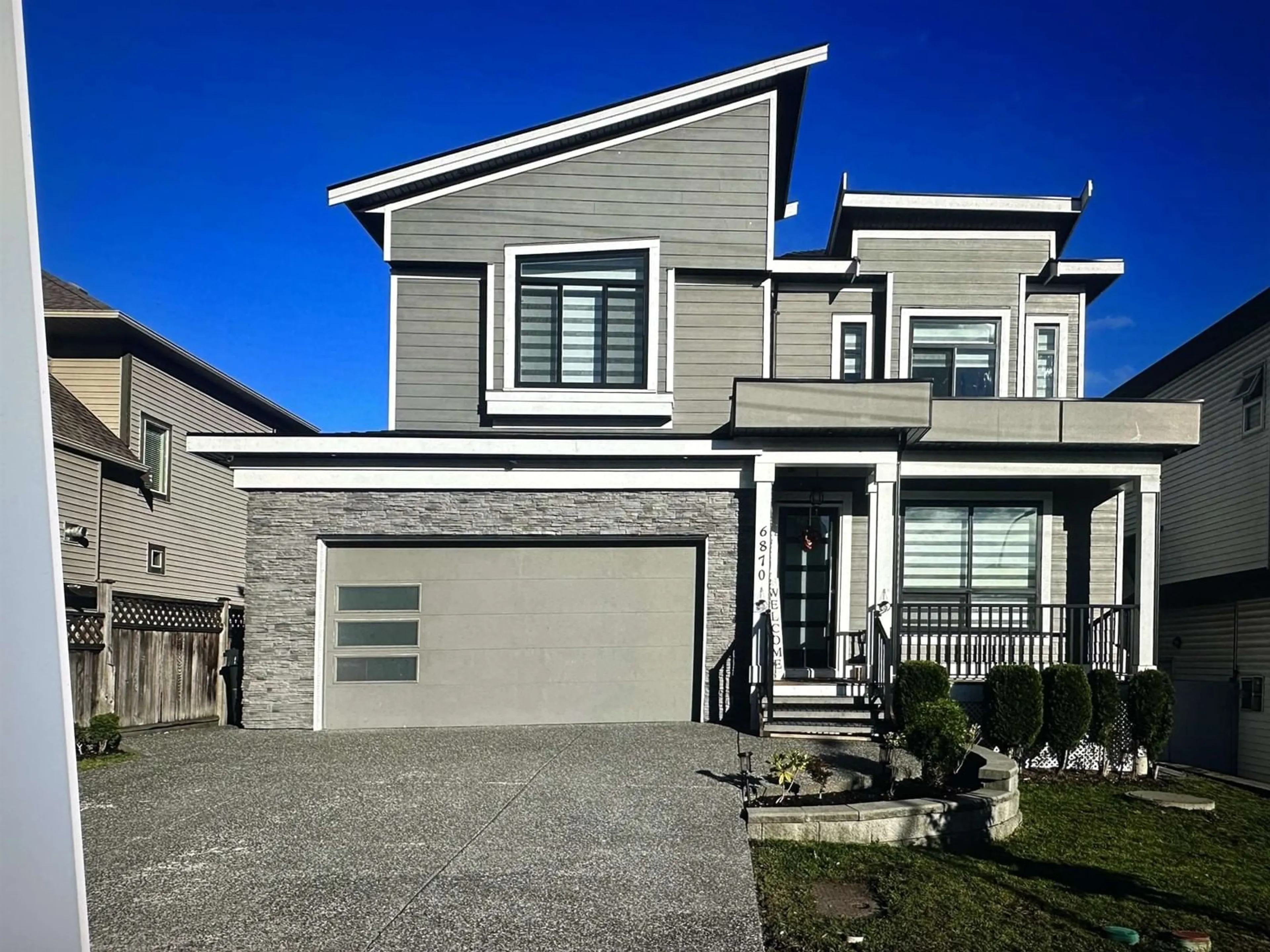 Home with vinyl exterior material, street for 6870 197B, Langley British Columbia V2Y3H4