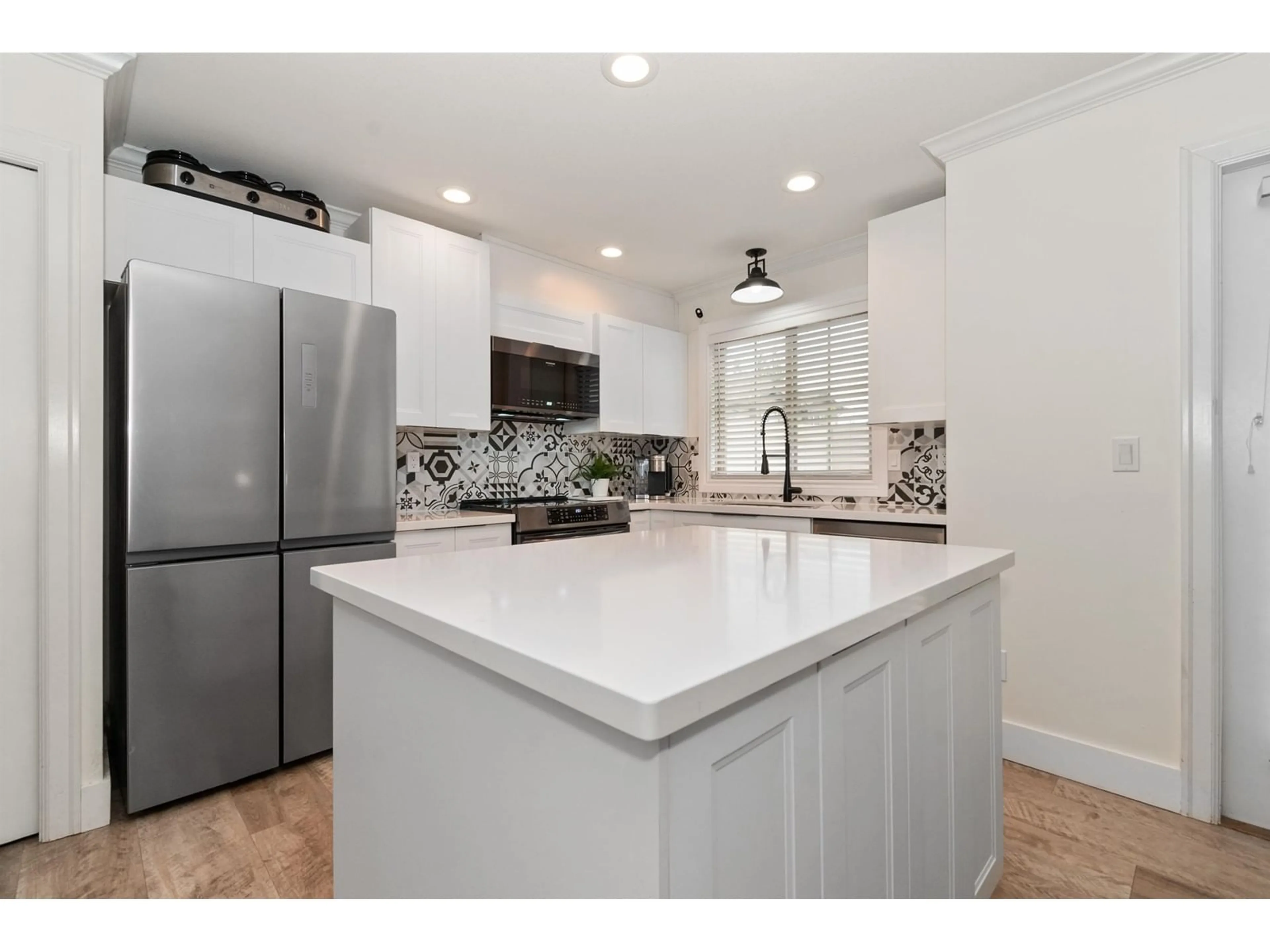Open concept kitchen, ceramic/tile floor for 23 - 6450 BLACKWOOD LANE, Chilliwack British Columbia V2R5Z3
