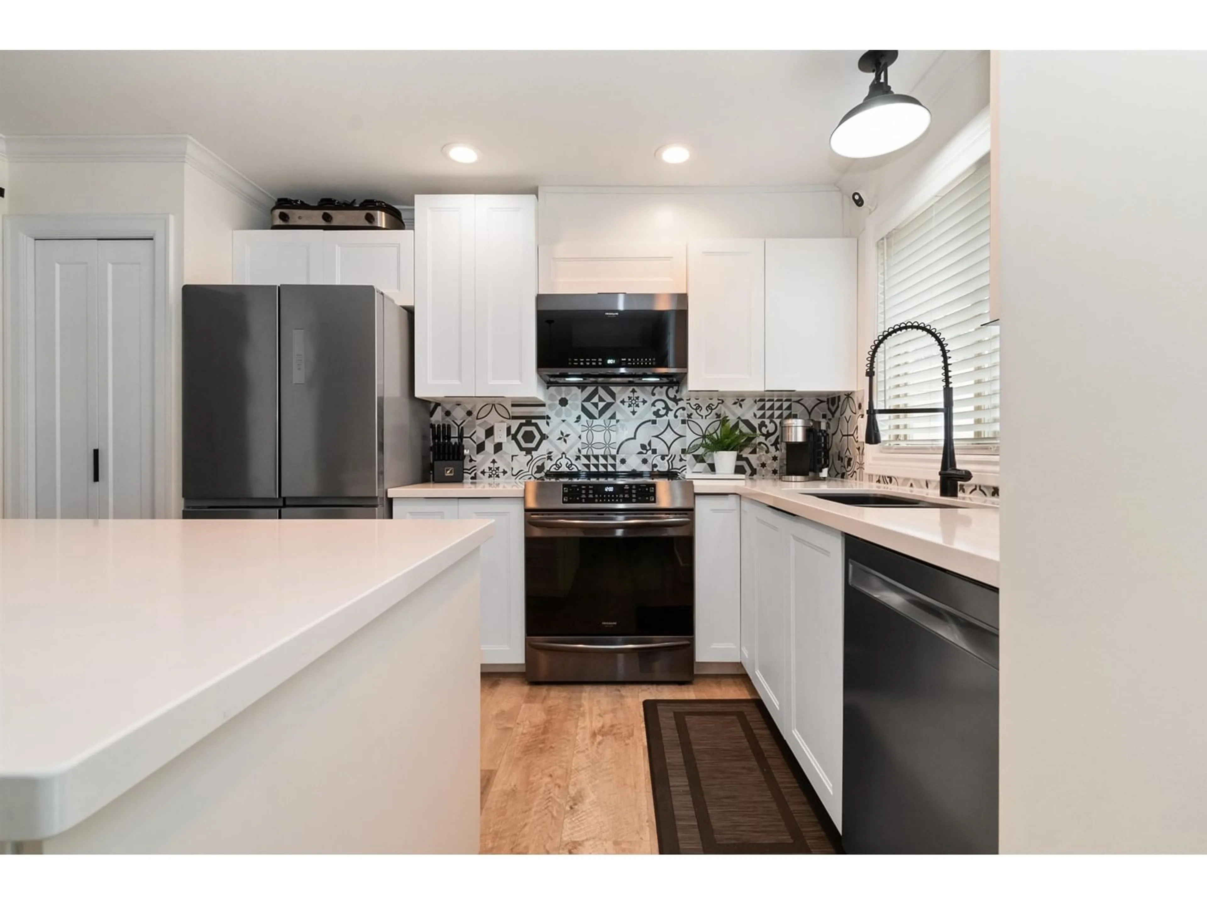 Open concept kitchen, ceramic/tile floor for 23 - 6450 BLACKWOOD LANE, Chilliwack British Columbia V2R5Z3