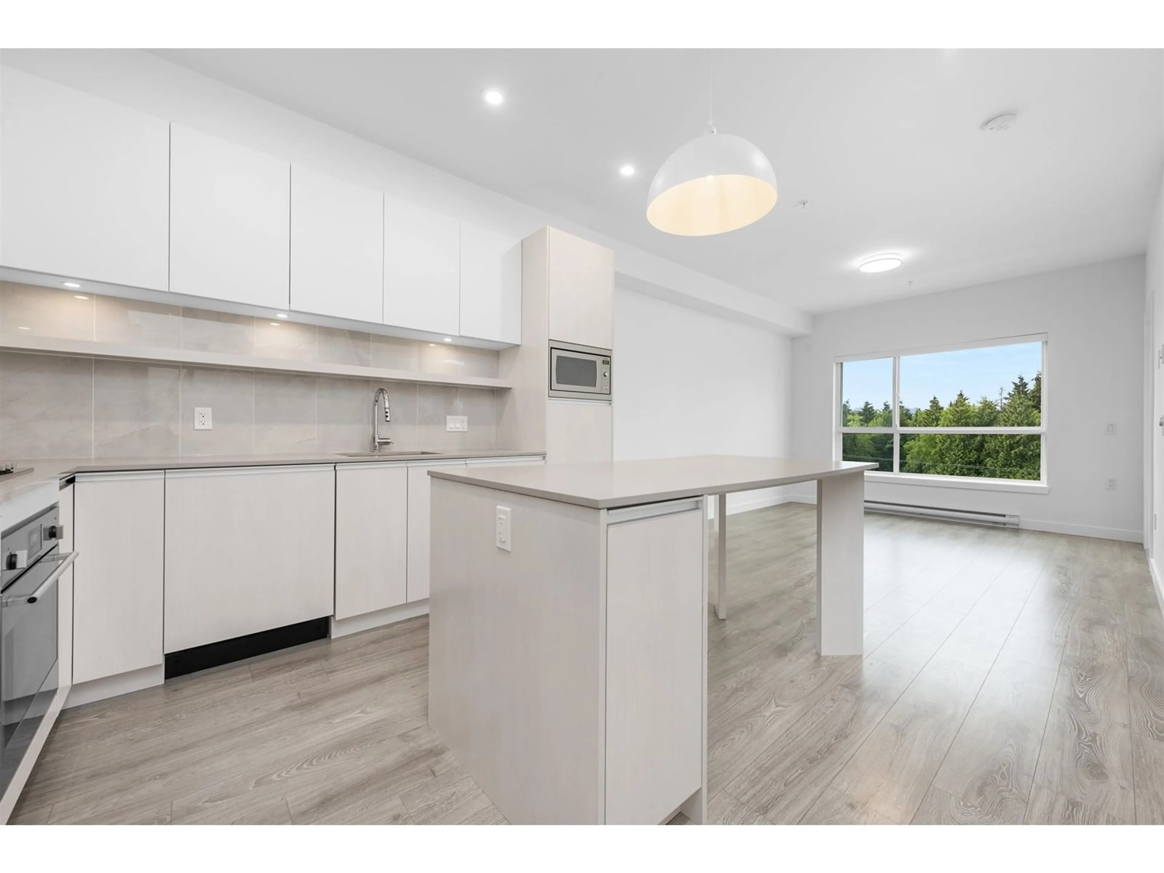Open concept kitchen, unknown for 506 - 14225 103A, Surrey British Columbia V3T0E1