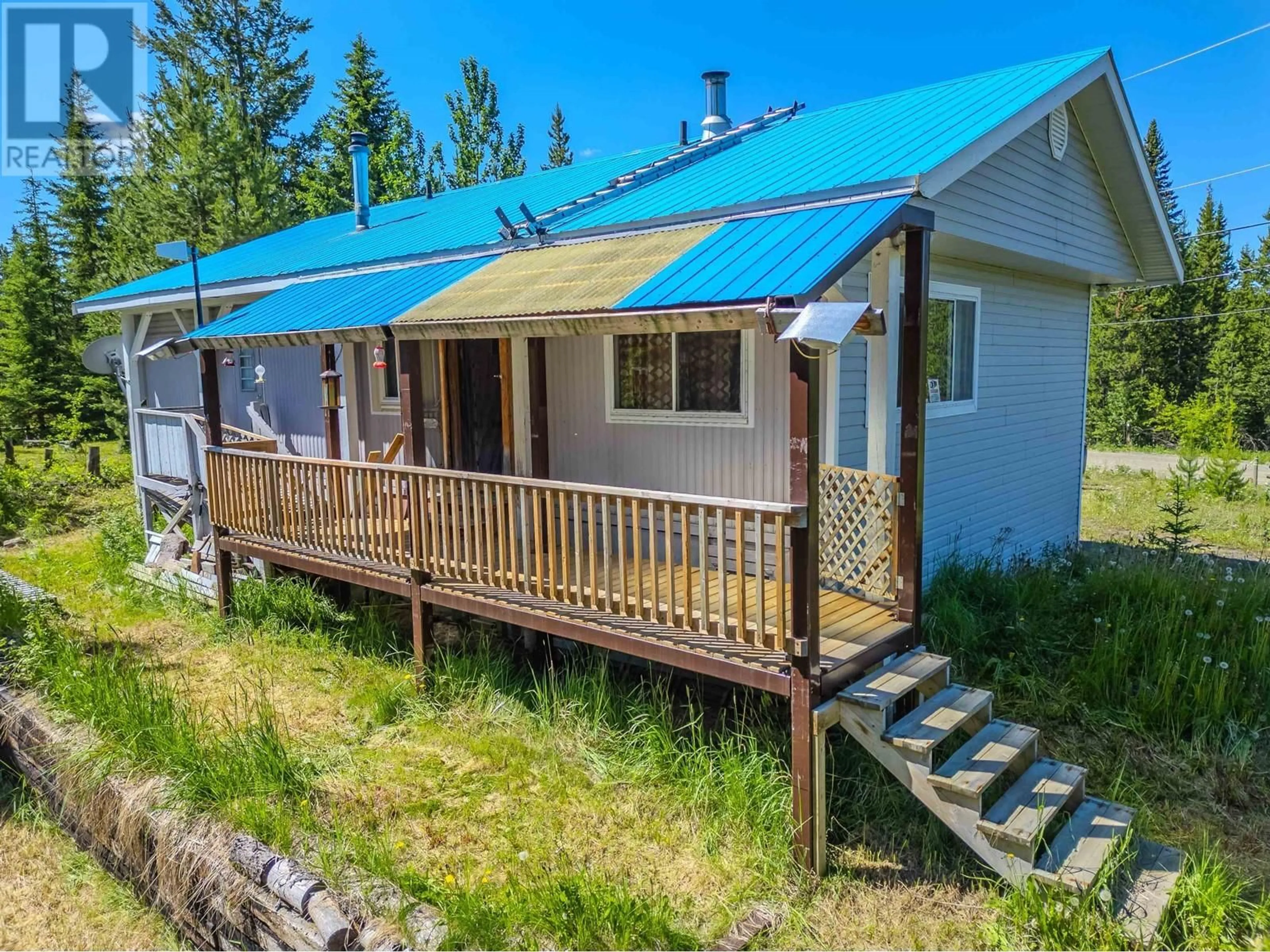A pic from outside/outdoor area/front of a property/back of a property/a pic from drone, unknown for 7559 HIGH COUNTRY ROAD, Bridge Lake British Columbia V0K1X2