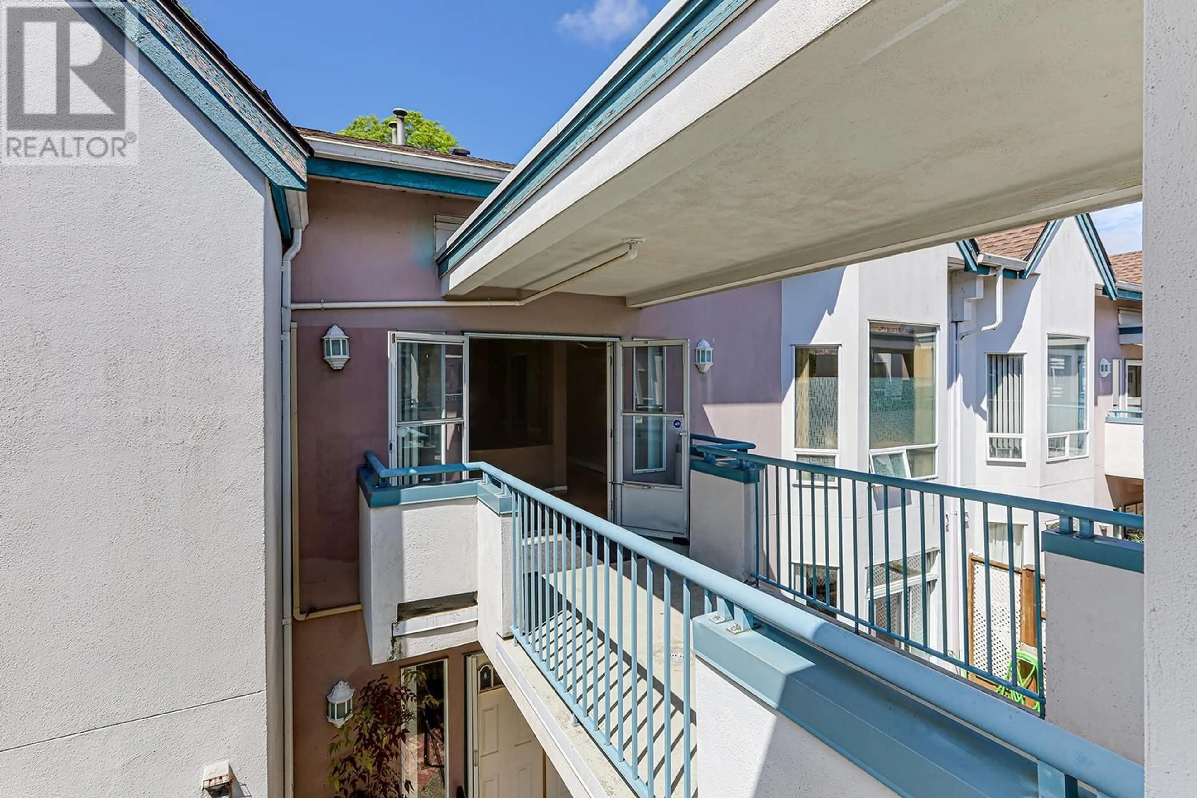 Balcony in the apartment, city buildings view from balcony for 303 - 7500 ABERCROMBIE DRIVE, Richmond British Columbia V6Y3J9