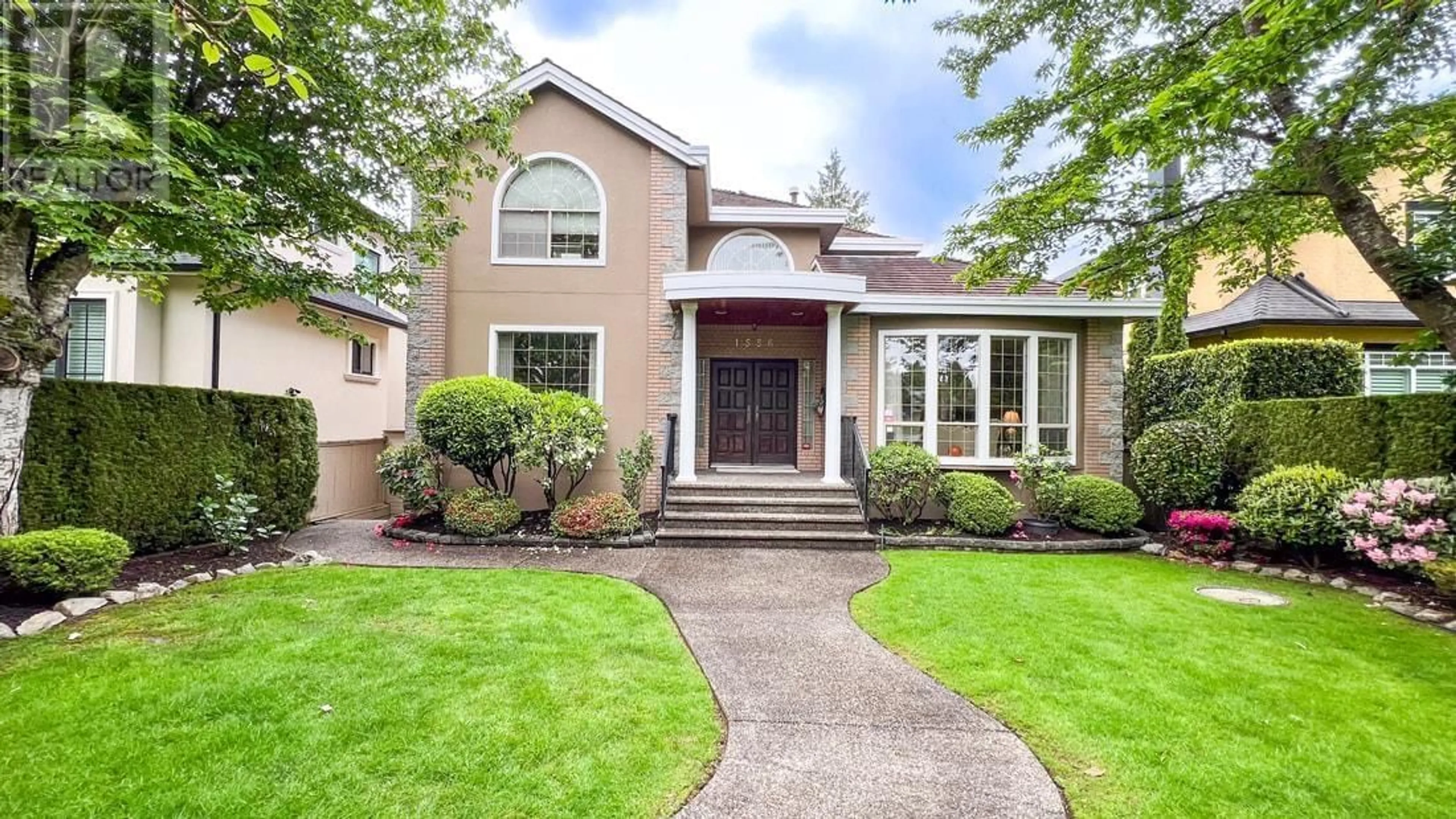 Home with vinyl exterior material, street for 1556 62ND AVENUE, Vancouver British Columbia V6P2E9